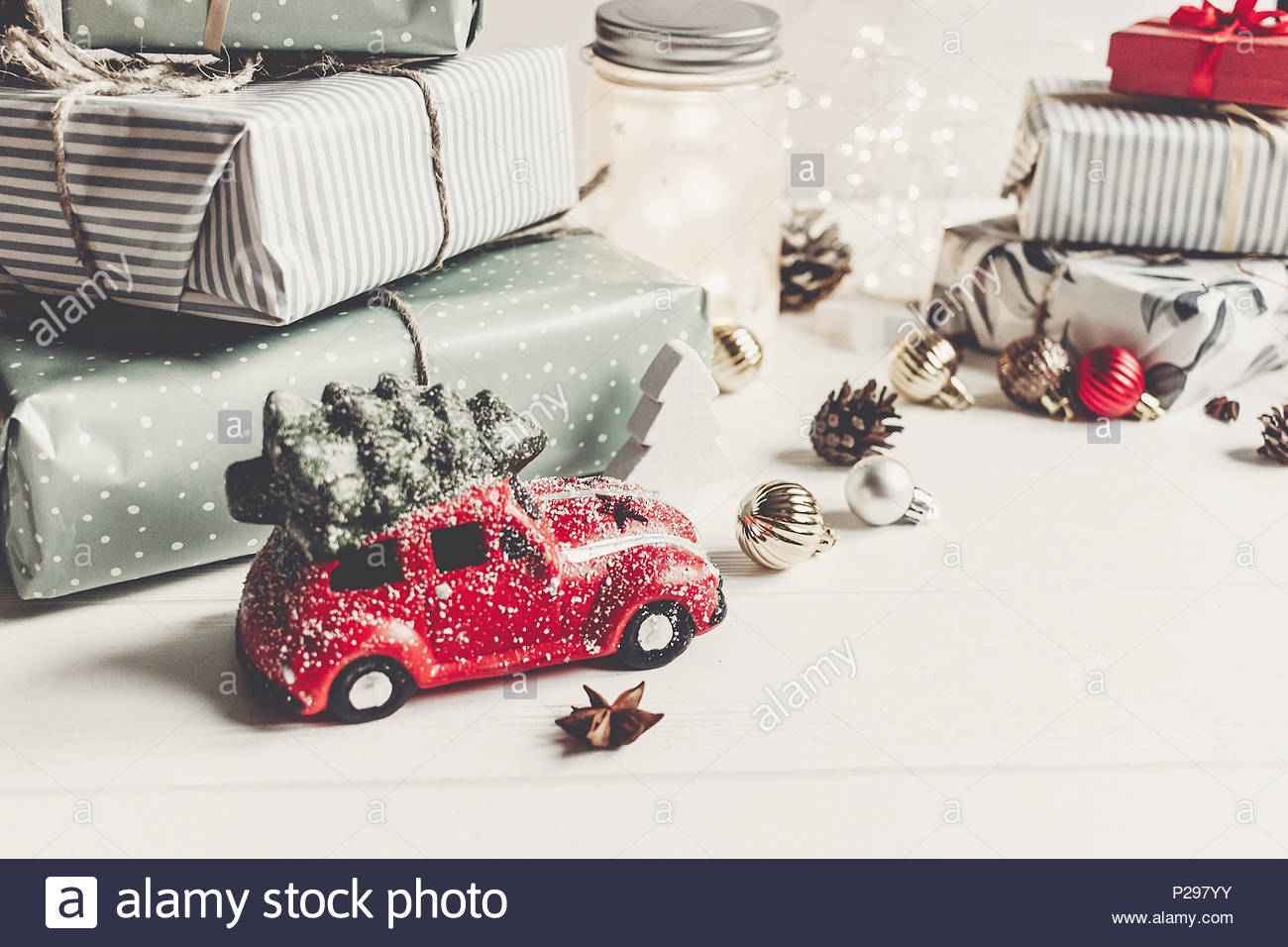 modern christmas ornaments and car toy with tree presents cones anise on white wooden background merry christmas concept seasonal greetings happy - Modern Christmas Ornaments modern christmas ornaments and car toy with tree presents cones anise on white wooden background merry christmas concept seasonal greetings happy - Modern Christmas Ornaments
