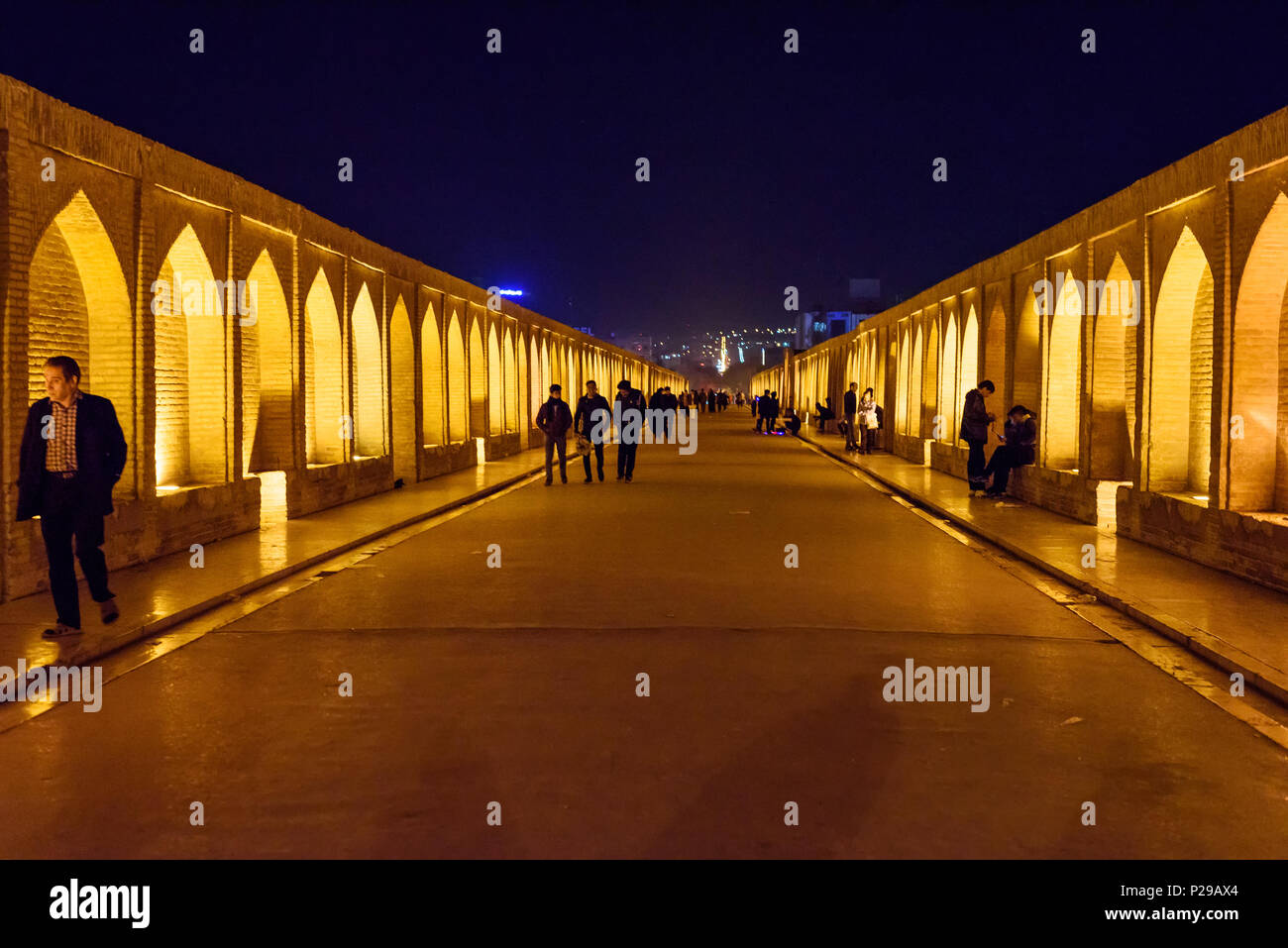 Isfahan, Iran - March 21, 2018: Iranian people walk on Allahverdi Khan ...