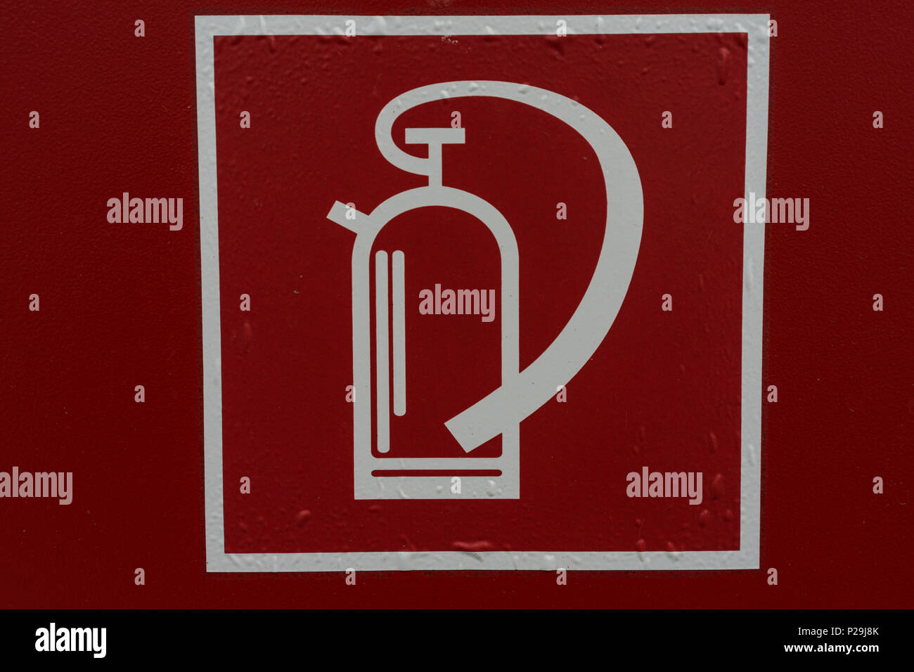 Fire Extinguisher Sign Retro Style On Red Background In White