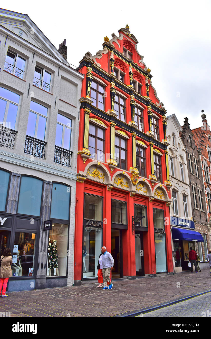 The splendid facade on this building epitomises the chic appeal of the Zara shop. located in the centre Bruges or Brugge, Belgium Stock Photo