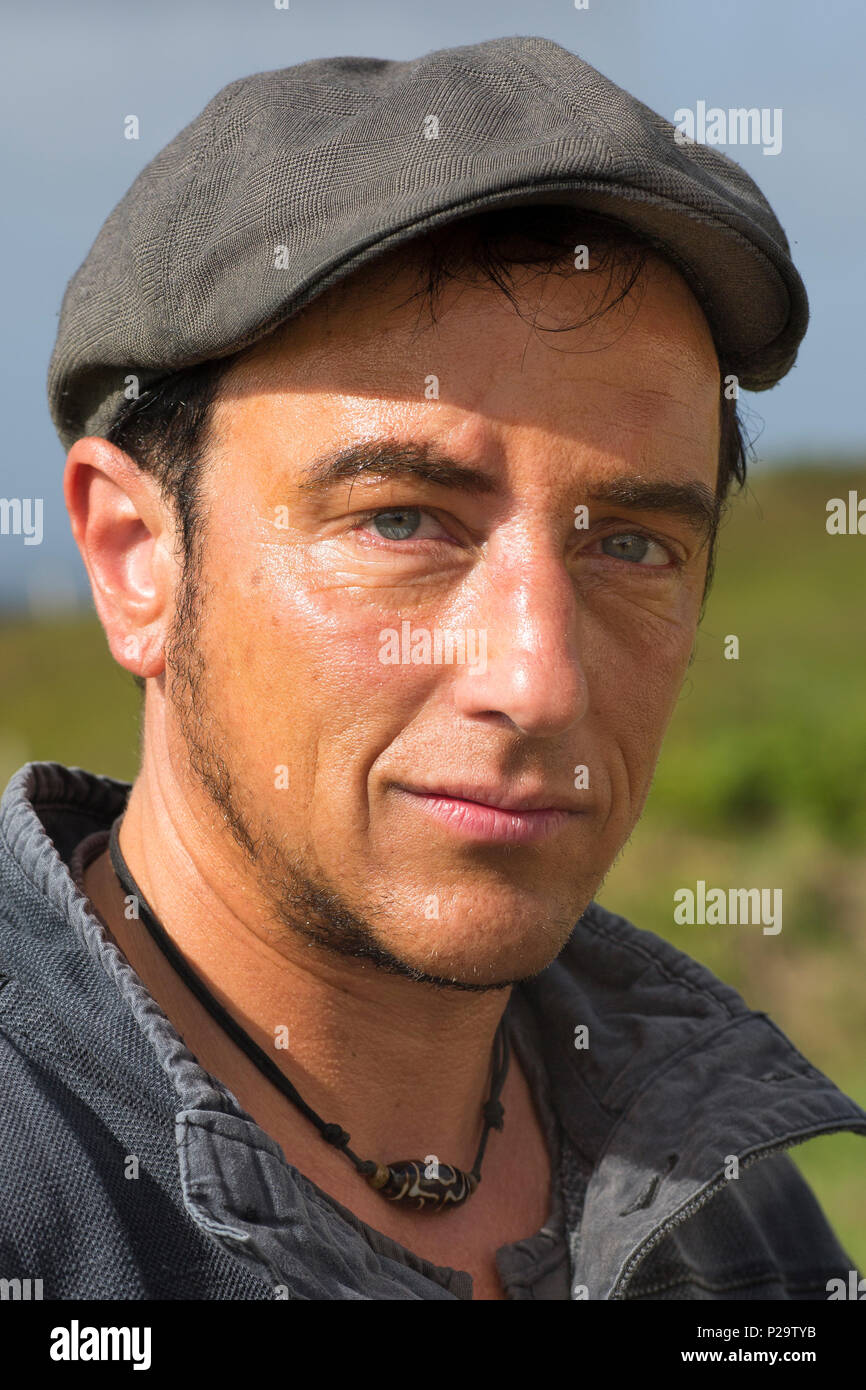 Israeli man wearing flat cap and casual clothes Stock Photo