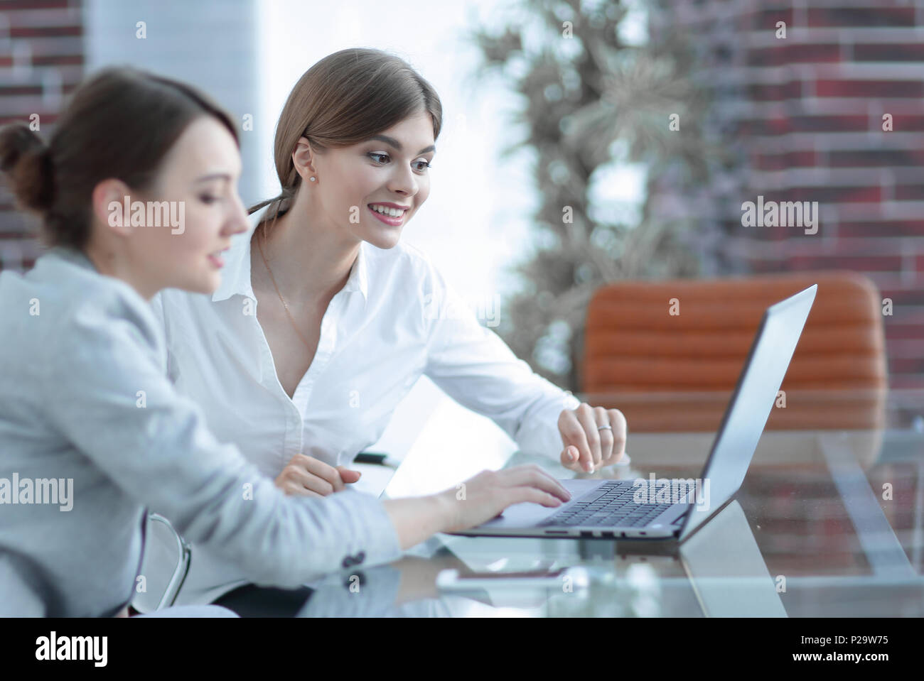 members of the business team working on laptop Stock Photo - Alamy