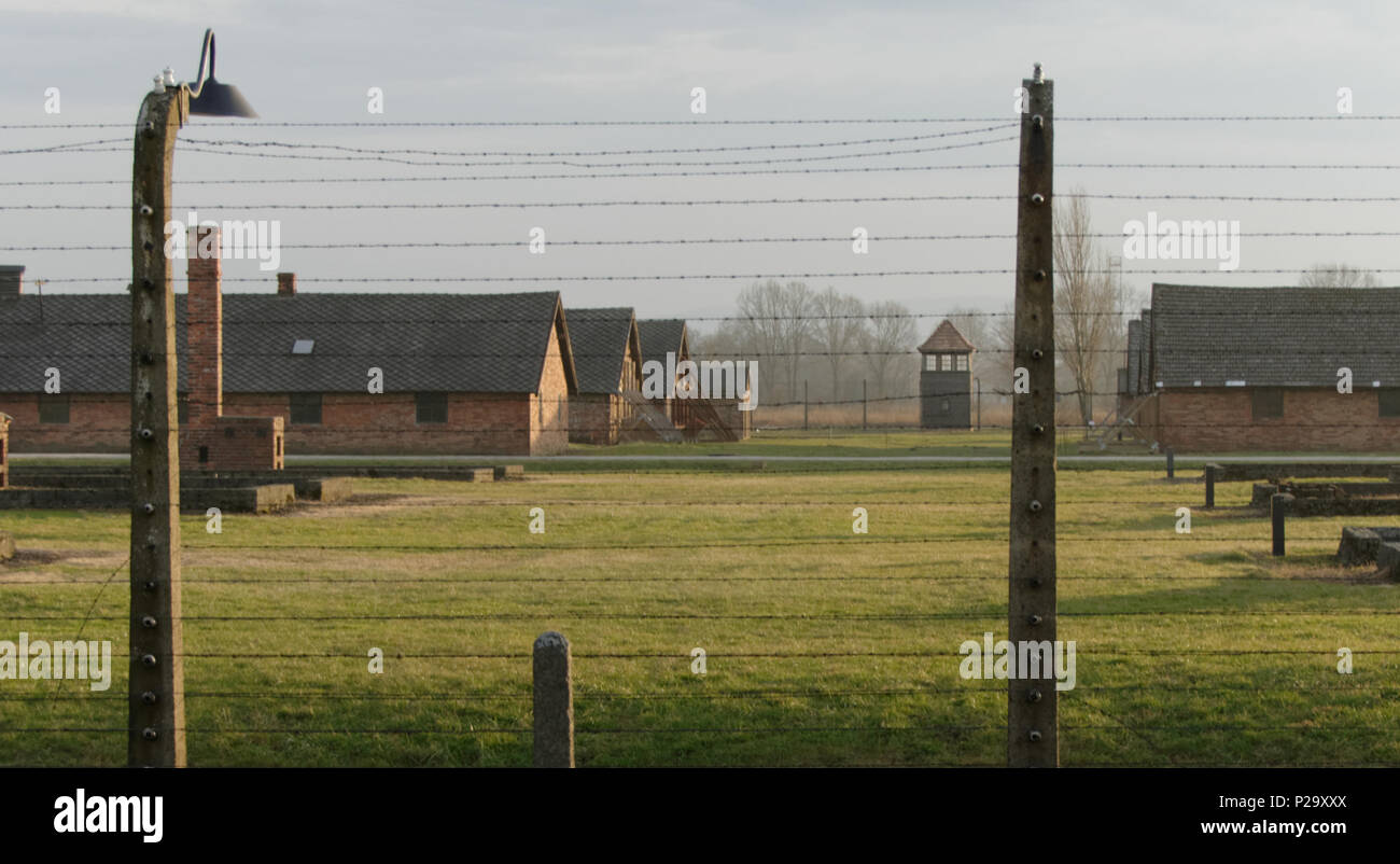 Dormitories of Auschwitz-Birkenau concentration camp at sunset Stock Photo