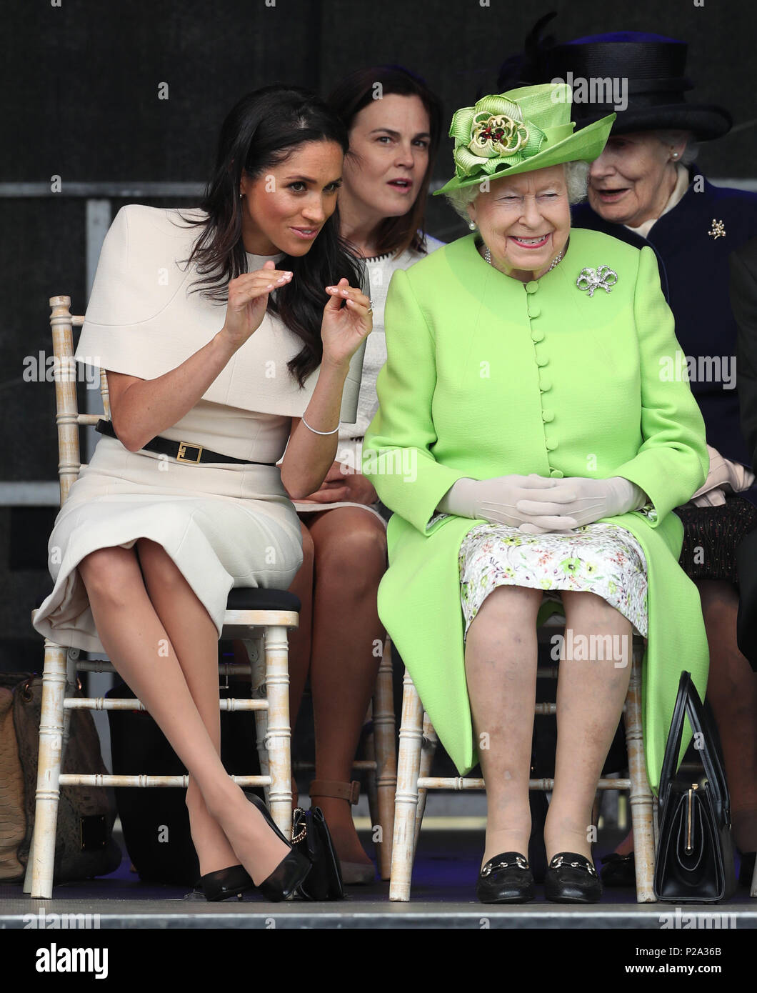 Queen Elizabeth II and the Duchess of Sussex at the opening of the new Mersey Gateway Bridge, in Widnes, Cheshire. In the background is Samantha Cohen, the Queen's former Assistant Private Secretary who is now working with the Duchess. Stock Photo