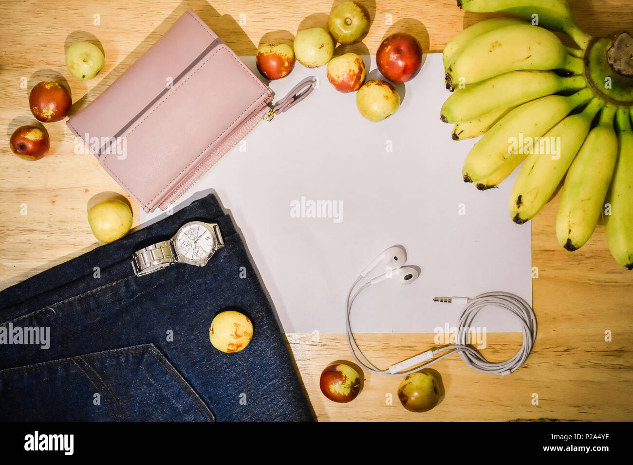 Watches and cashmere and fashion jeans are placed on the