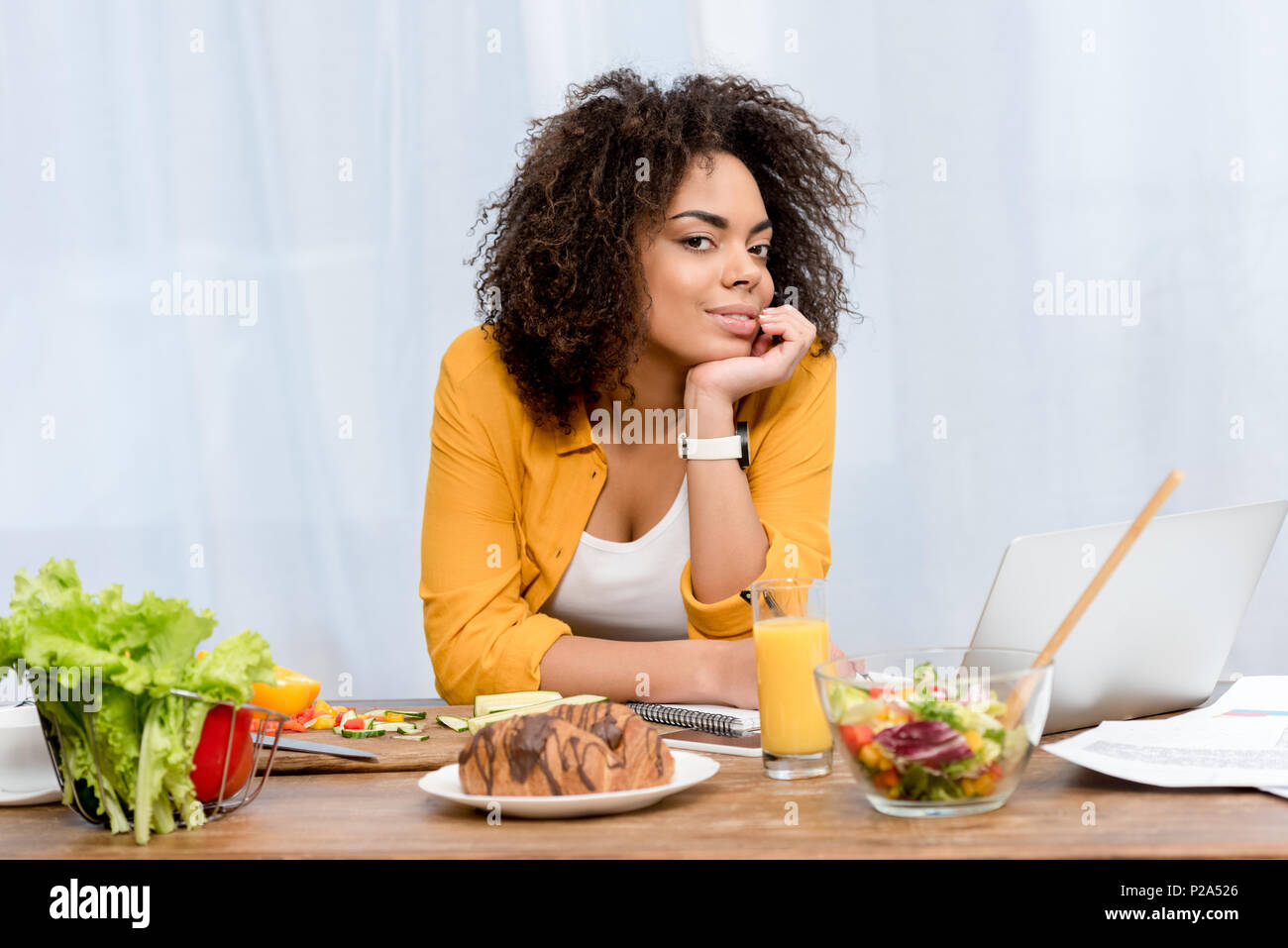 Woman leaning on table hi-res stock photography and images - Alamy