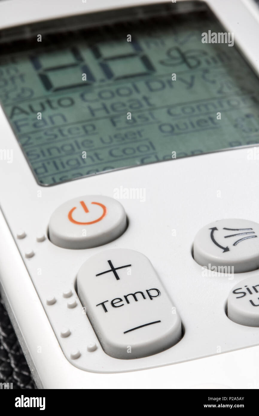 Remote control with display for using air conditioner, close up. Stock Photo