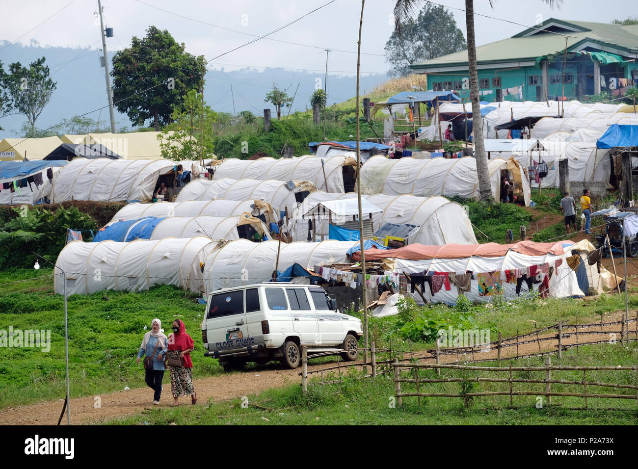 Tents of a camp for fleeing inhabitants of the ruined city of Marawi. Mindanao Island, Philippines - Zelte eines Camps für geflohene Bewohner der zerstörten Stadt Marawi. Insel Mindanao, Philippinen Stock Photo