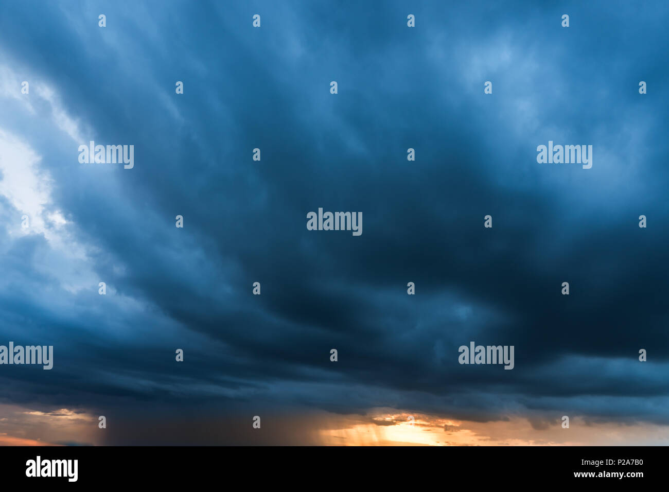 storm cloud background during raining. Dark Clouds. Huge black clouds ...