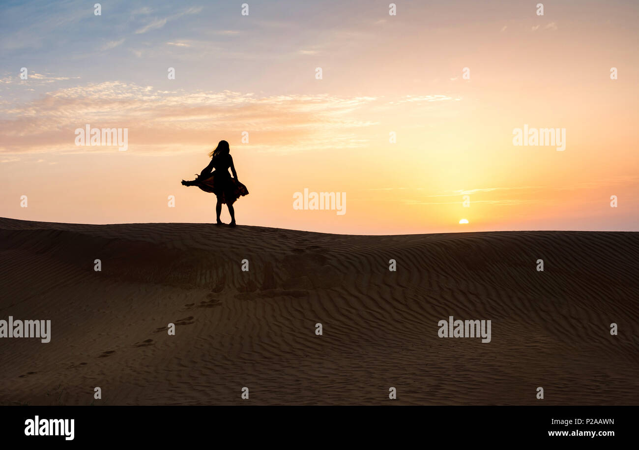 Woman in desert landscape hi-res stock photography and images - Alamy