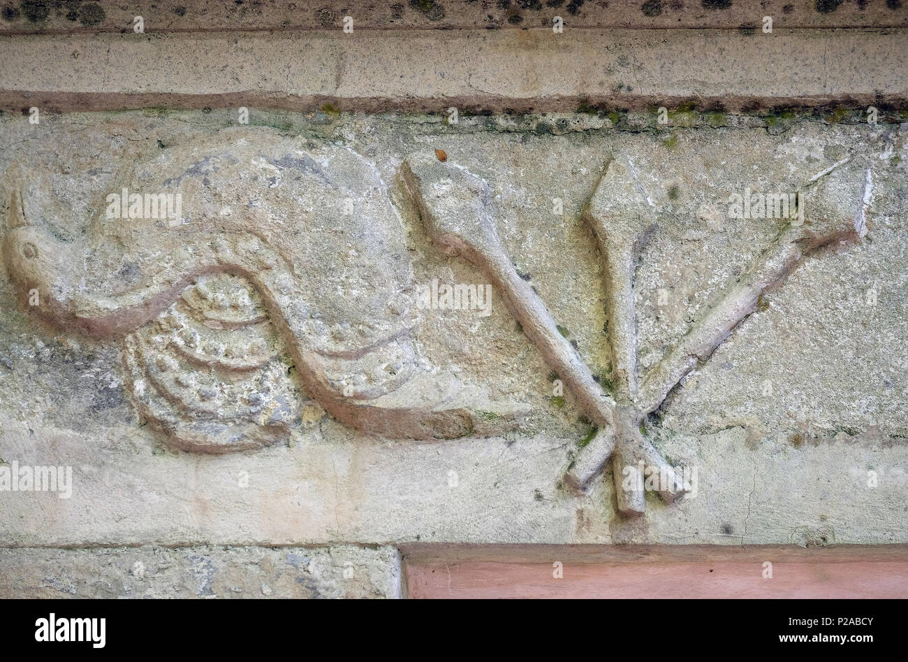 The entrance portal with the symbols of the Passion of Christ, the chapel of St. Wolfgang in Vukovoj, Croatia Stock Photo