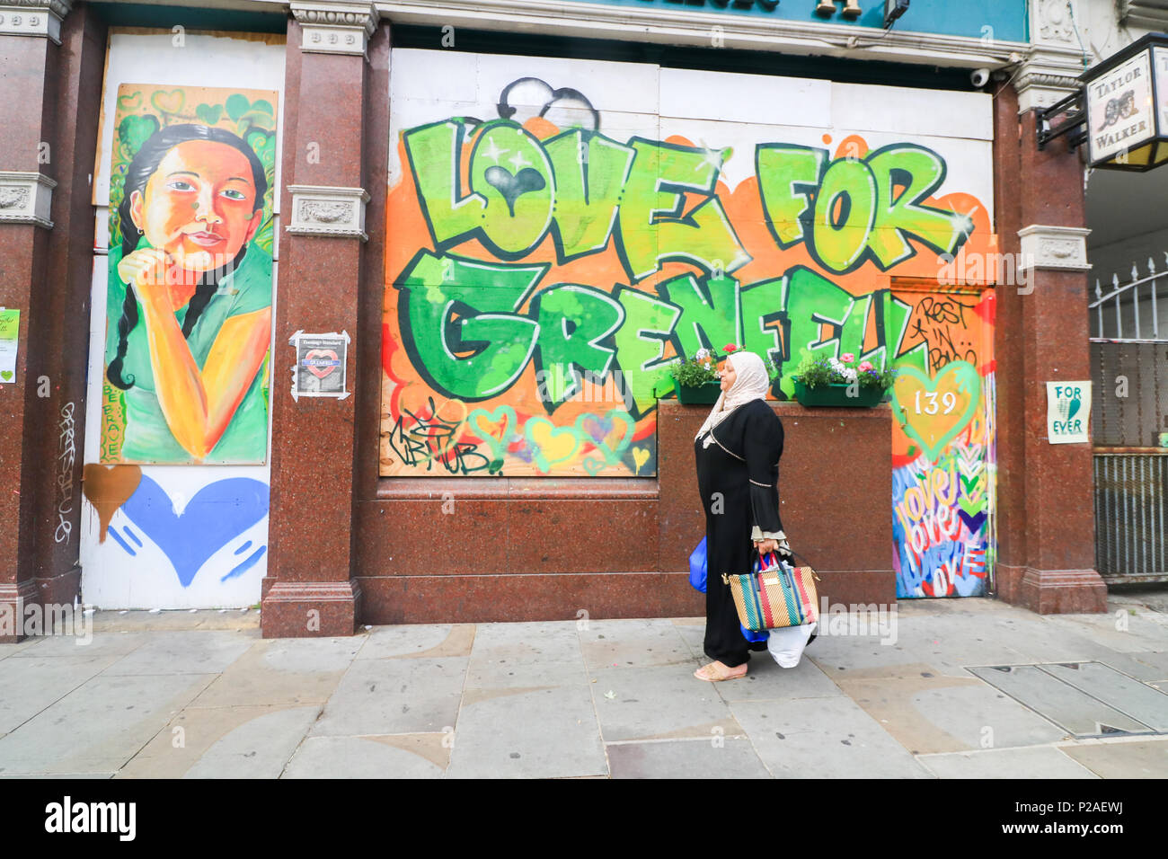 London UK. 14th June 2018.  One Year anniversary after the fire  in West London which claimed the lives of 72 residents in the tower block.  A minute's silence will be observed nationally at midday to remember the victims of the Grenfell fire on 14 June 2017. Credit: amer ghazzal/Alamy Live News Stock Photo