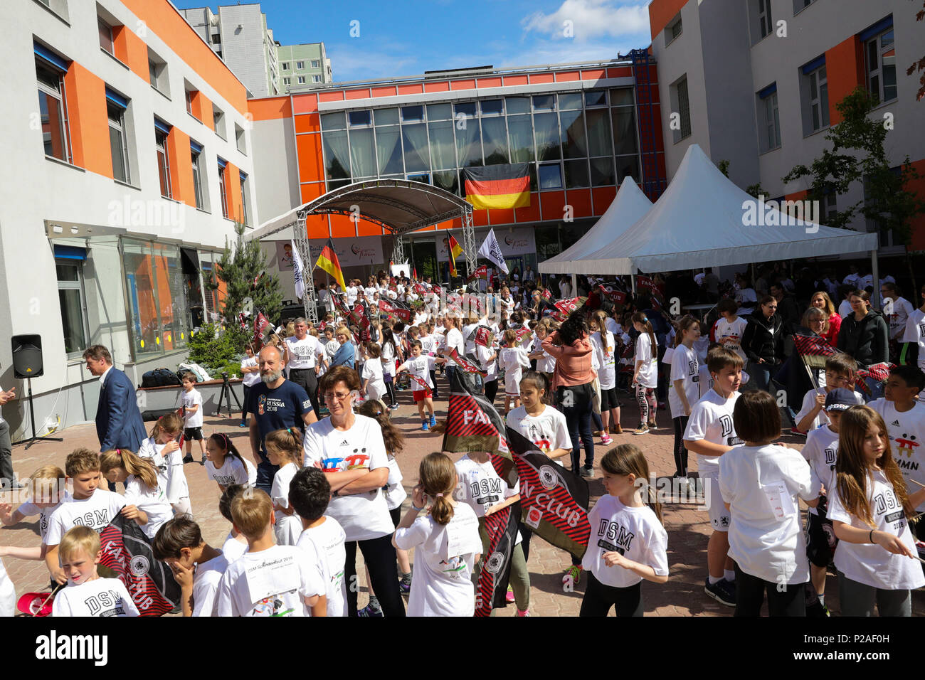 14 June 2018, Russia, Moscow: Soccer, World Cup, National Team of Germany:  Students, teachers and guests of the German School Moscow celebrate a summer  party. As part of a summer party on