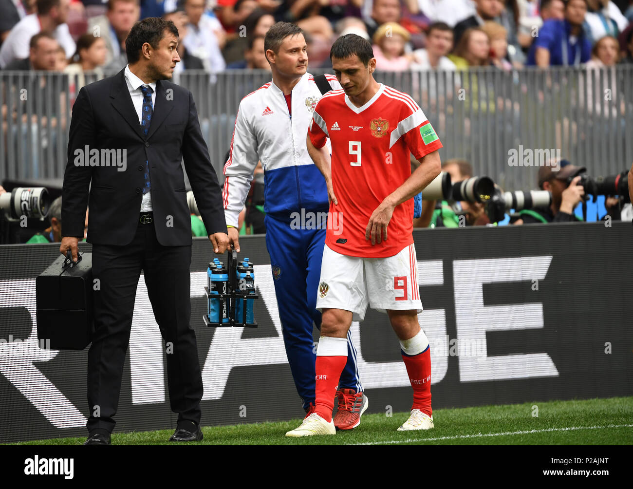 Moscow, Russia. 14th June, 2018. Moscow, Russia. 14th June, 2018. Soccer; FIFA World Cup, First Round, Group A, First Matchday, Russia vs. Saudi Arabia at the Luzhniki Stadium: Alan Dsagojew from Russia leaves the match after an injury. Photo: Federico Gambarini/dpa Credit: dpa picture alliance/Alamy Live News Credit: dpa picture alliance/Alamy Live News Stock Photo