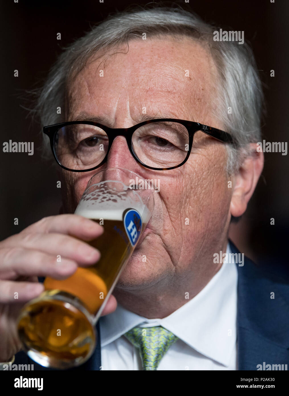 Munich, Germany. 14th Jun, 2018. 14 June 2018, Germany, Munich: Jean-Claude  Juncker, President of the European Commission, drinks a beer after his  speech in the Bavarian Landtag. Photo: Sven Hoppe/dpa Credit: dpa
