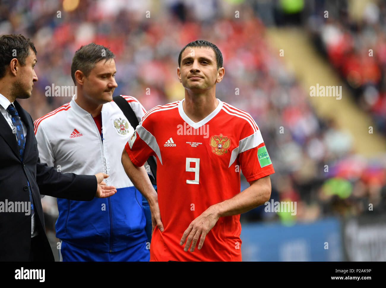 Moscow, Russia. 14th June, 2018. Russia's Alan Dzagoev leaves the pitch after his injury during the opening match against Saudi Arabia at the 2018 FIFA World Cup in Moscow, Russia, on June 14, 2018. Credit: Liu Dawei/Xinhua/Alamy Live News Stock Photo