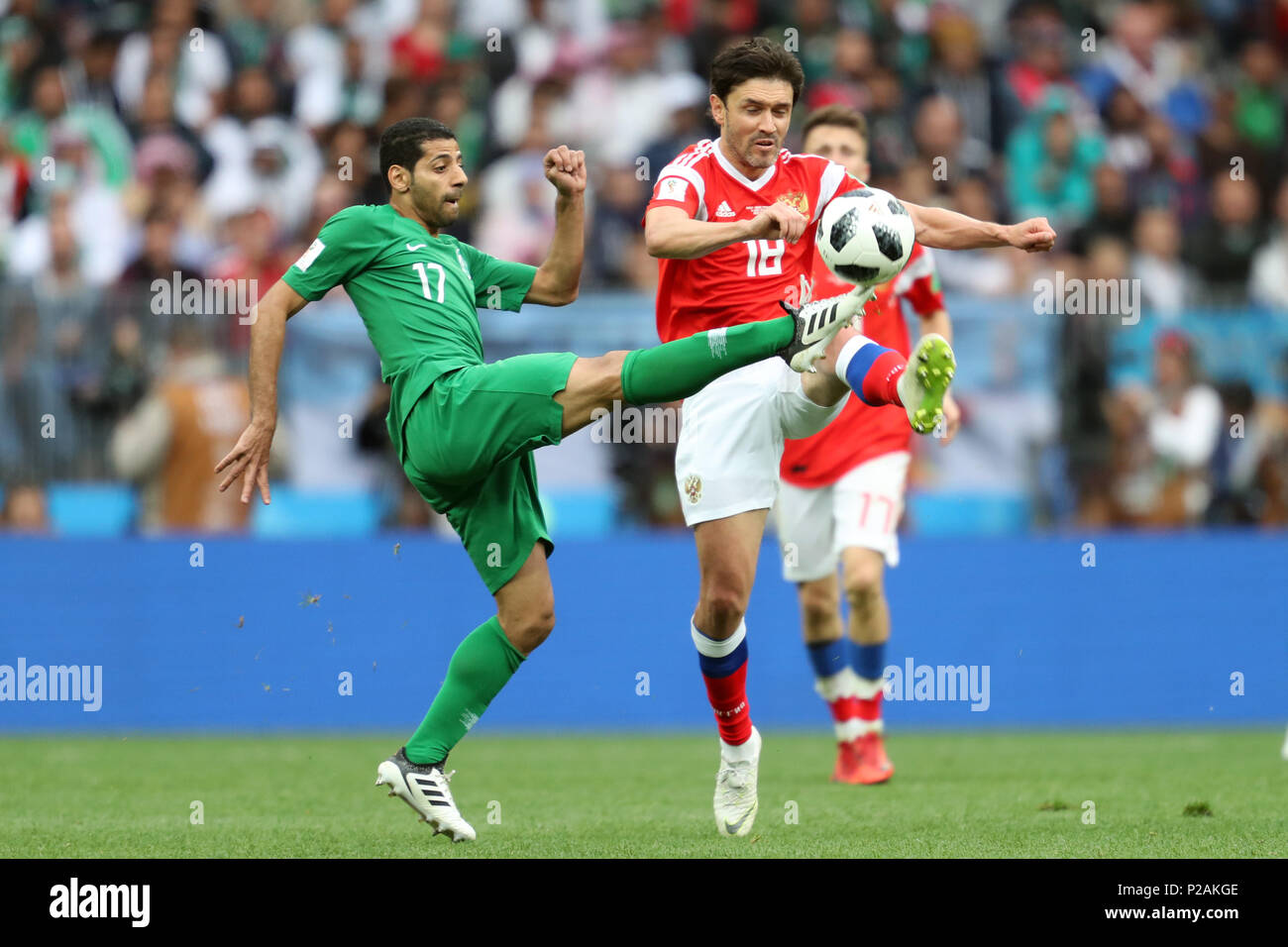 Moscow, Russia. 14th Jun, 2018. Taisir Al-Jassim & Yury Zhirkov RUSSIA V SAUDI ARABIA RUSSIA V SAUDI ARABIA, 2018 FIFA WORLD CUP RUSSIA 14 June 2018 GBC8012 2018 FIFA World Cup Russia STRICTLY EDITORIAL USE ONLY. If The Player/Players Depicted In This Image Is/Are Playing For An English Club Or The England National Team. Then This Image May Only Be Used For Editorial Purposes. No Commercial Use. Credit: Allstar Picture Library/Alamy Live News Stock Photo