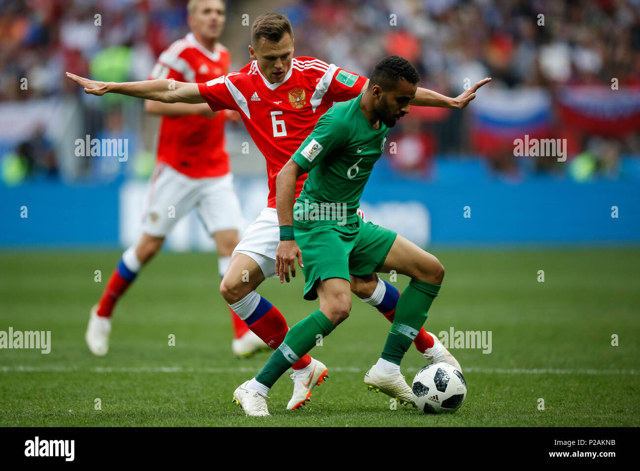 Moscow, Russia. 14th June 2018. Denis Cheryshev of Russia and Mohammed Al-Breik of Saudi Arabia during the 2018 FIFA World Cup Group A match between Russia and Saudi Arabia at Luzhniki Stadium on June 14th 2018 in Moscow, Russia. Credit: PHC Images/Alamy Live News Stock Photo