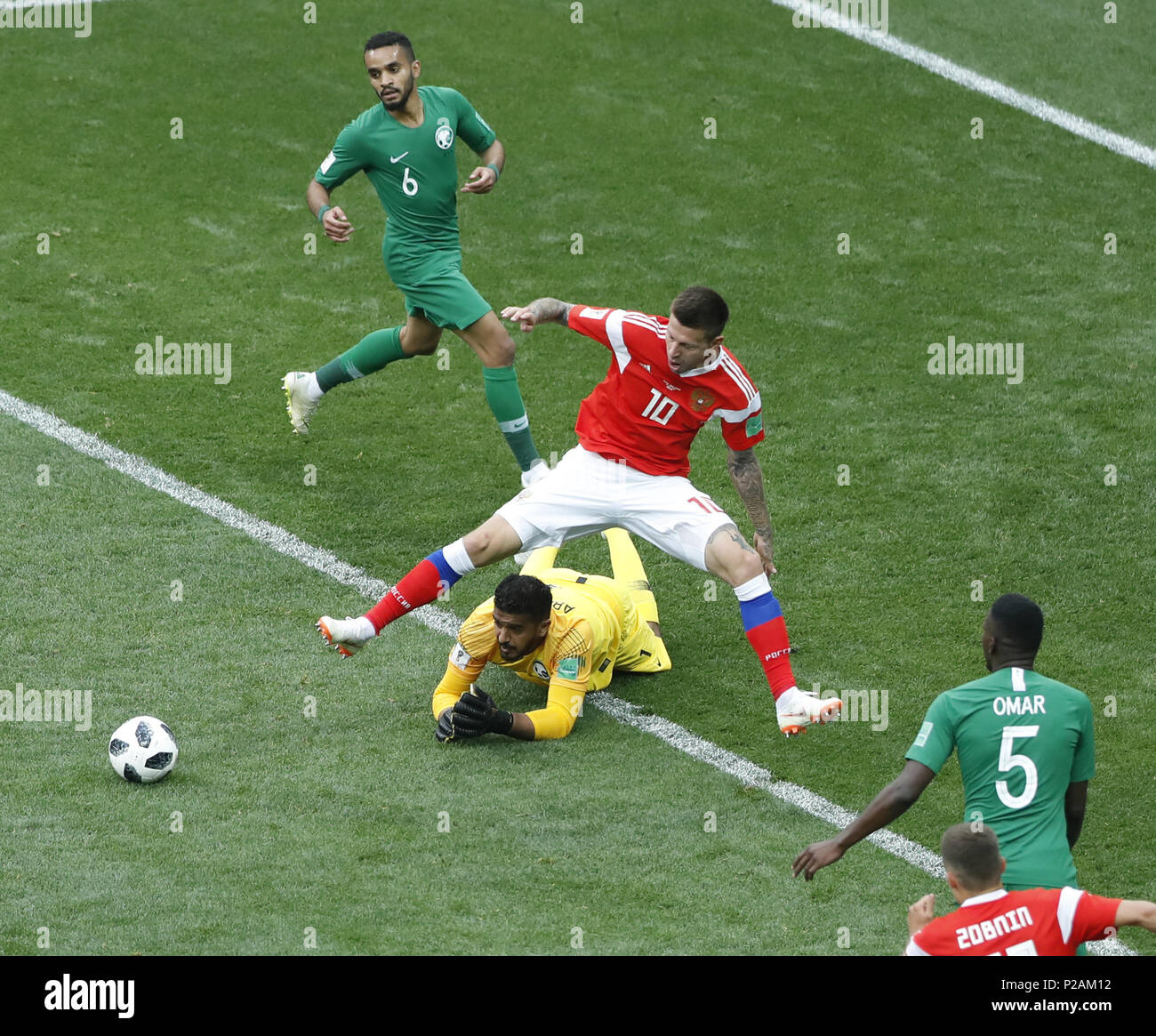 Moscow, Russia. 14th June, 2018. Russia's Fedor Smolov (C) competes during the opening match against Saudi Arabia at the 2018 FIFA World Cup in Moscow, Russia, on June 14, 2018. Credit: Cao Can/Xinhua/Alamy Live News Stock Photo