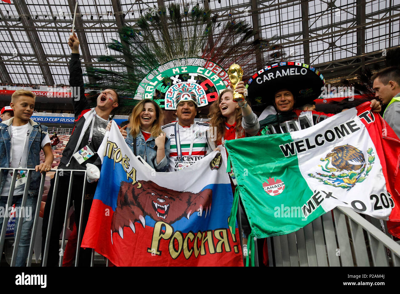 Moscow, Russia. 14th June 2018. Russian and Mexican fans during the 2018 FIFA World Cup Group A match between Russia and Saudi Arabia at Luzhniki Stadium on June 14th 2018 in Moscow, Russia. Credit: PHC Images/Alamy Live News Stock Photo