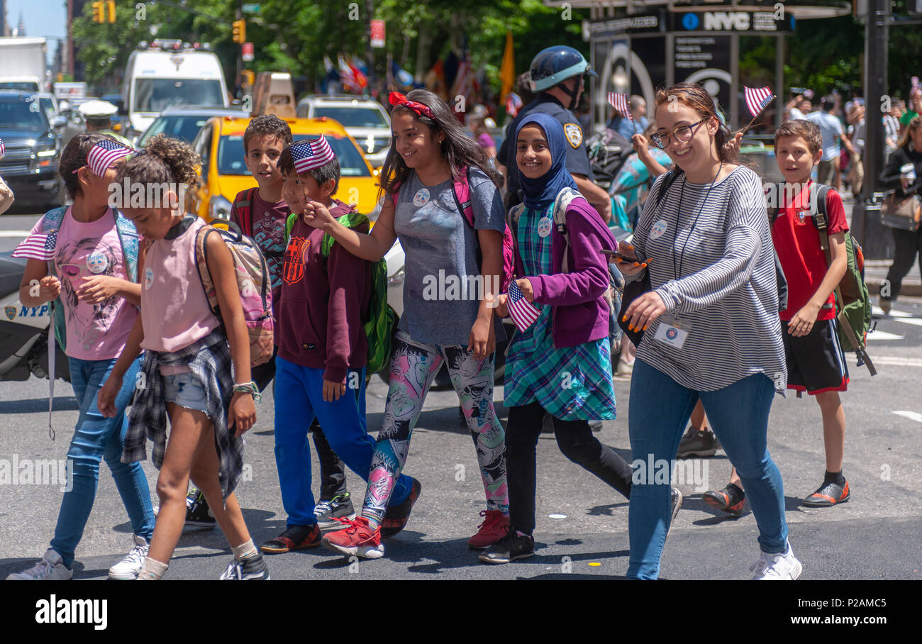 New York, USA. 14th Jun, 2018. Marchers in the annual Flag Day Parade in New York on Thursday, June 14, 2018, starting at New York City Hall Park.  Flag Day was created by proclamation by President Woodrow Wilson on June 14, 1916 as a holiday honoring America's flag but it was not until 1949 when it became National Flag Day.  The holiday honors the 1777 Flag Resolution where the stars and stripes were officially adopted as the flag of the United States. (© Richard B. Levine) Credit: Richard Levine/Alamy Live News Stock Photo
