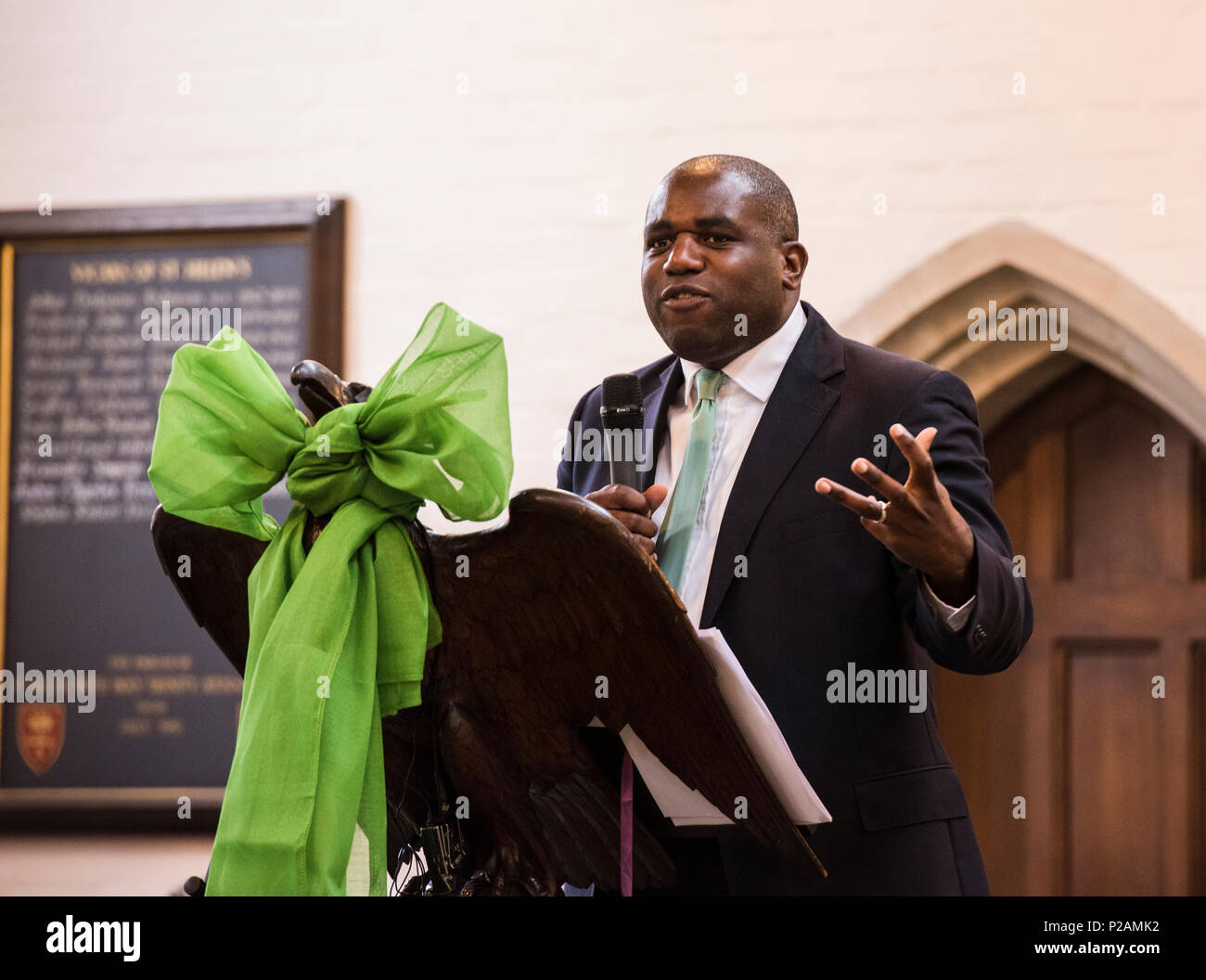 MP David Lammy addresses the congregation while attending the service to mark the Grenfell Fire anniversary in St Helen's Church, North Kensington, London, England, UK, 14th June, 2018 Stock Photo