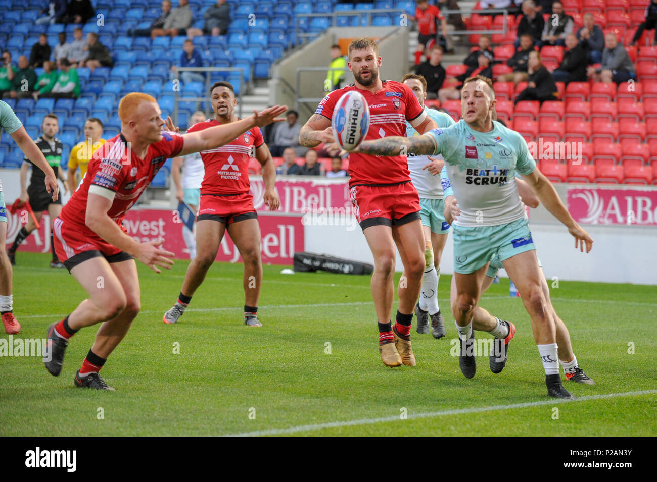 Salford, UK. 14th Jun, 2018. Thursday 14th June 2018 , AJ Bell Stadium, Salford, England; Betfred Super League, Salford Red Devils v Widnes Vikings; Danny Craven of Widnes Vikings prevents Josh Wood of Salford Red Devils puncing on the ball for a try Credit: News Images /Alamy Live News Stock Photo