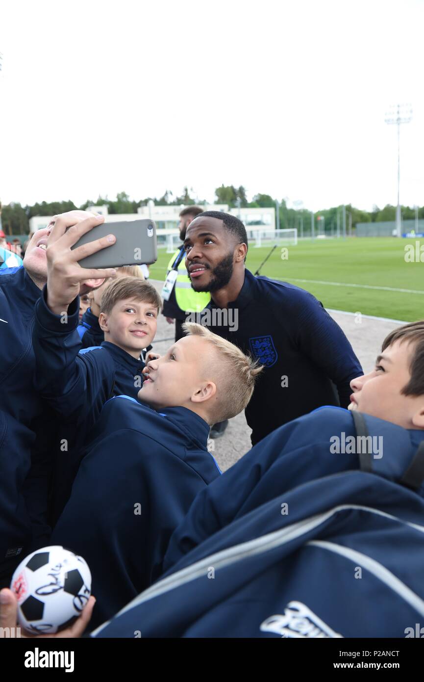 Raheem Sterling signs autographs for fans during the training session at the Spartak Zelenogorsk.  photo by Shoja Lak 13.06.2018 Credit: Shoja Lak/Alamy Live News Stock Photo