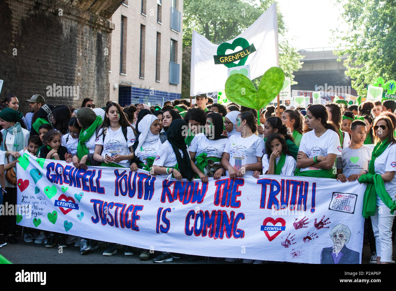 London, UK. 14th June, 2018. Members of the Grenfell community and supporters take part in the Grenfell Silent March through West Kensington on the first anniversary of the Grenfell Tower fire. 72 people died in the Grenfell Tower fire and over 70 were injured. Credit: Mark Kerrison/Alamy Live News Stock Photo