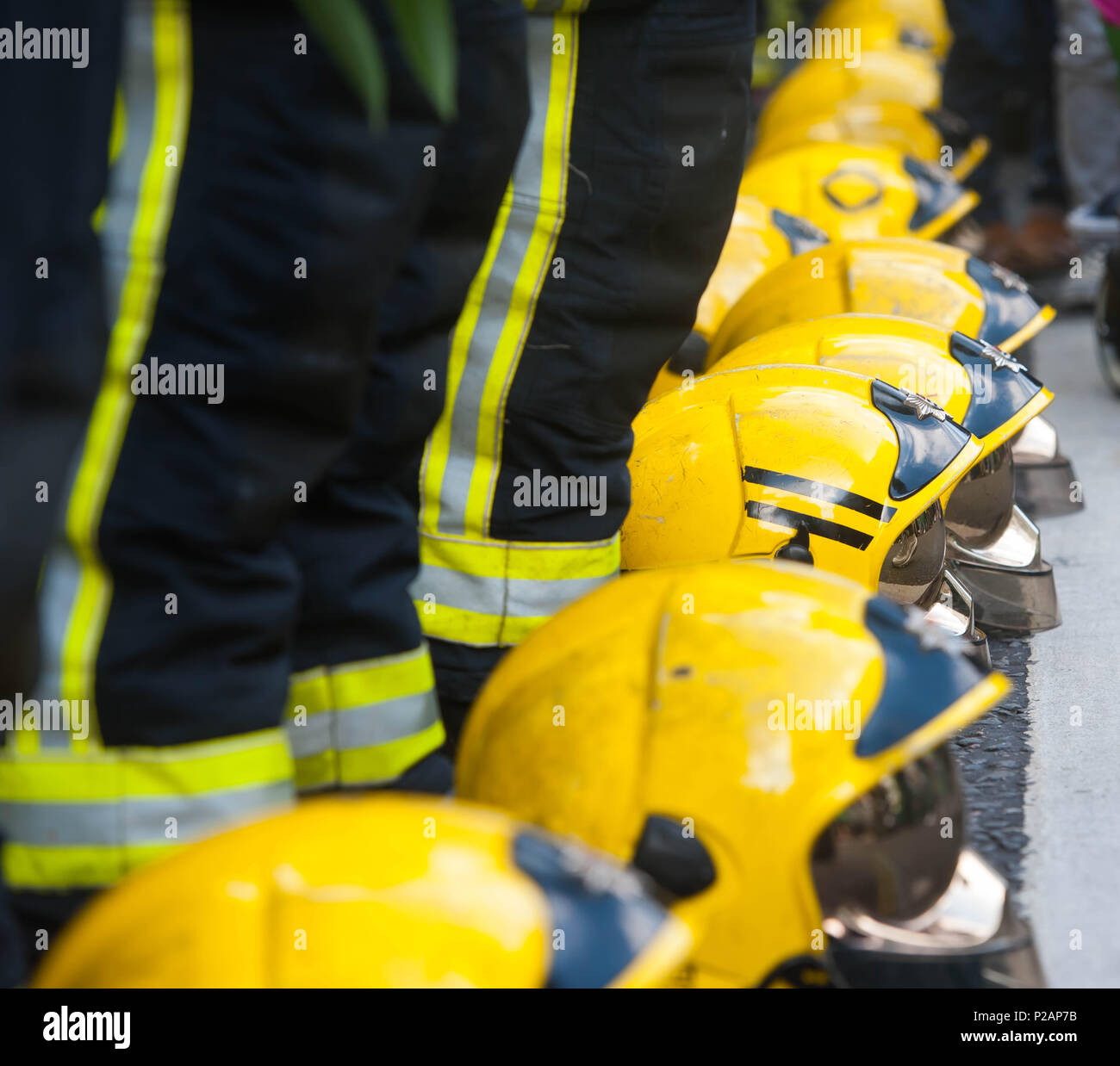 London, England. 14th June 2018. People stop to hug / greet firefighters during a silent march. Grenfell Tower fire. Silent walk is held to mark the first anniversary of the Grenfell Tower fire, which claimed the lives of 72 people. ©Michael Tubi/Alamy Live News Stock Photo