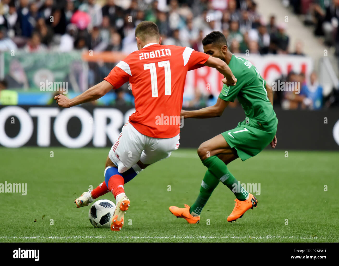 Moscow, Russia - June 14, 2018. Saudi Arabian midfielder Salman Alfaraj against Russian midfielder Roman Zobnin in the opening match of FIFA World Cup 2018 Russia vs Saudi Arabia. Credit: Alizada Studios/Alamy Live News Stock Photo