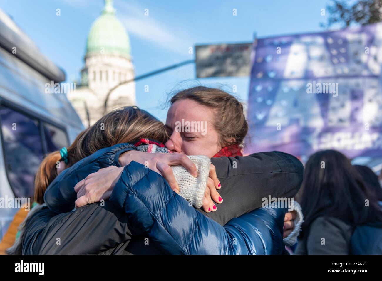 Buenos Aires, Argentina. 14th June, 2018. Two women hug and celebrate as Argentine lawmakers approved a bill to legalize elective abortions following a heated debate over a proposal that would make the country the first major Latin American nation to ease strict antiabortion laws. Chamber of Deputies narrowly approves legislation allowing abortions during the first 14 weeks of pregnancy. Credit: Maximiliano Javier Ramos/ZUMA Wire/Alamy Live News Stock Photo