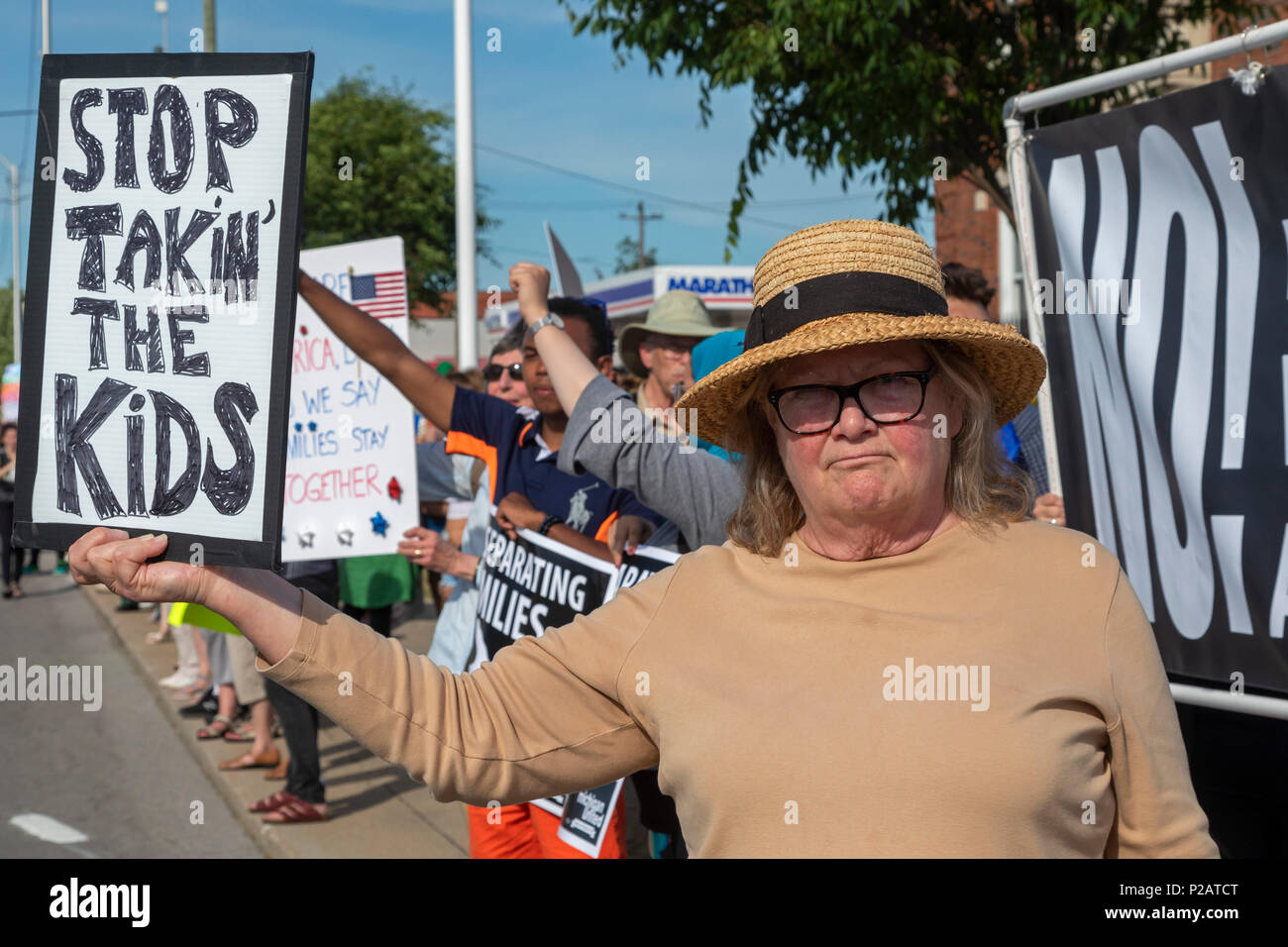 Detroit, Michigan USA - 14 June 2018 - Protesters oppose the Trump administration's policy of separating young children from their parents at the U.S.-Mexico border. Lining the street outside the Immigration and Customs Enforcement detention center, the group was part of nationwide protests in many cities organized by Families Belong Together. Credit: Jim West/Alamy Live News Stock Photo