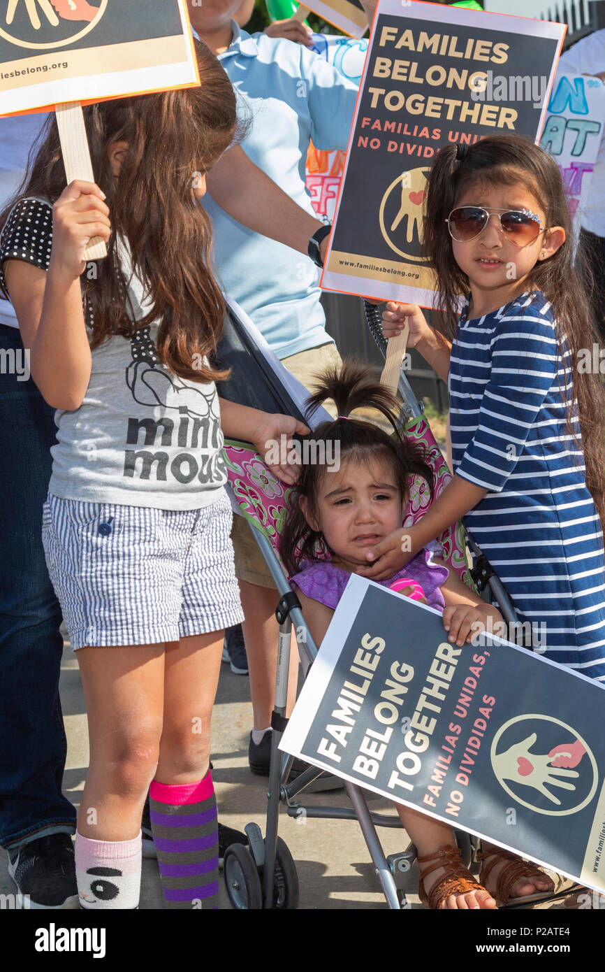 Detroit, Michigan USA - 14 June 2018 - Protesters oppose the Trump administration's policy of separating young children from their parents at the U.S.-Mexico border. Lining the street outside the Immigration and Customs Enforcement detention center, the group was part of nationwide protests in many cities organized by Families Belong Together. Credit: Jim West/Alamy Live News Stock Photo