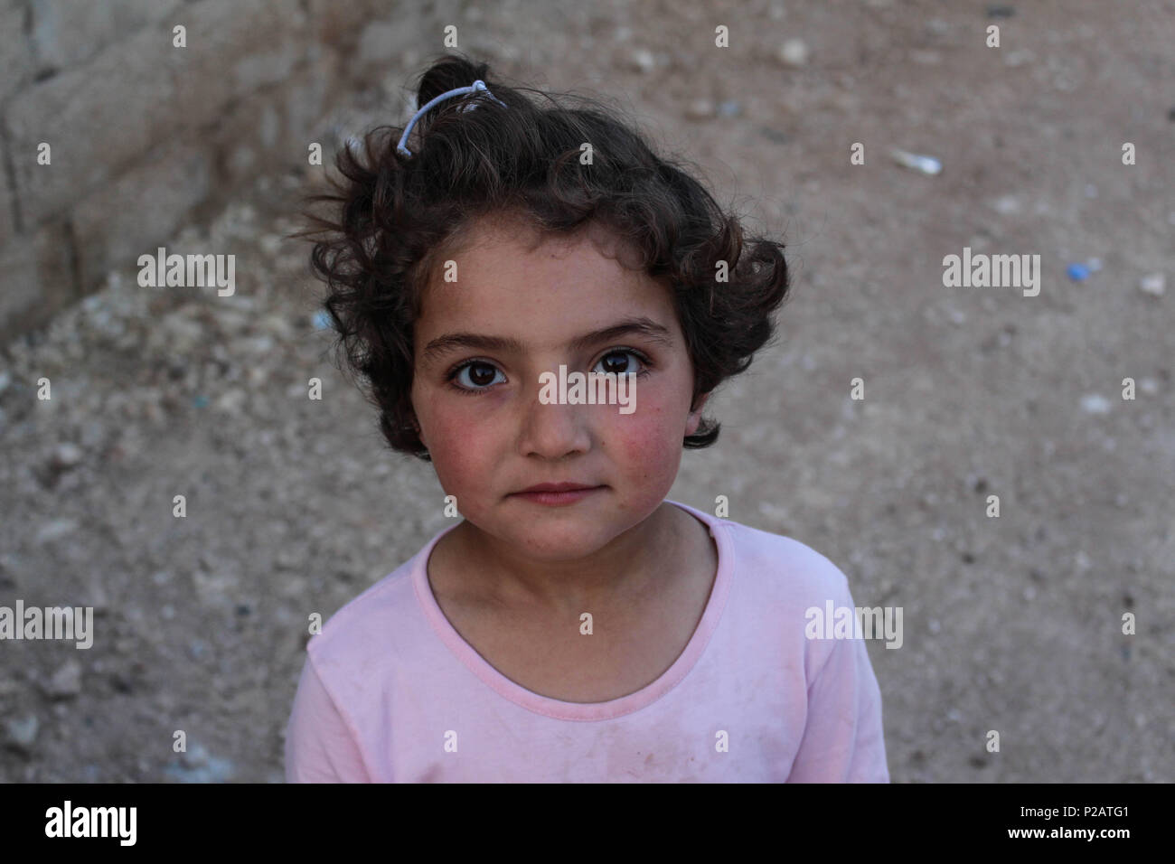 Azaz Syria 14th June 2018 A Kid Standing Staring At The Camera Eid Al Fitr Atmosphere In Al Tadhamon Camp In The Countryside Of Azaz City Where People Live Displaced From Aleppo City And The
