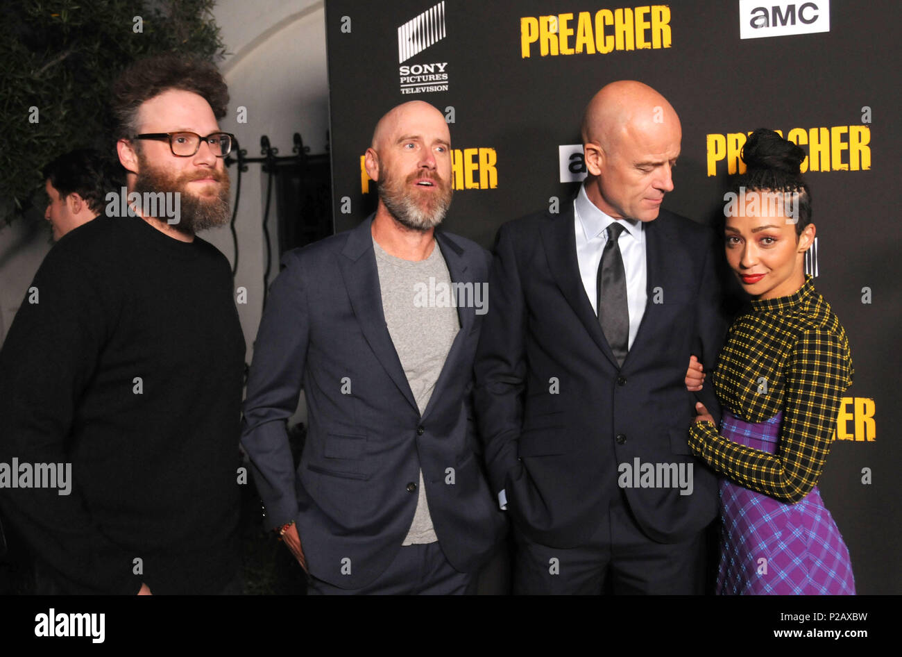 LOS ANGELES, CA - JUNE 14: (L-R) Executive producers Seth Rogen, executive producer/showrunner Sam Catlin, actor Pip Torrens and actress Ruth Negga attend AMC's 'Preacher' Season 3 Premiere Party on June 14, 2018 at The Hearth and Hound in Los Angeles, California. Photo by Barry King/Alamy Live News Stock Photo