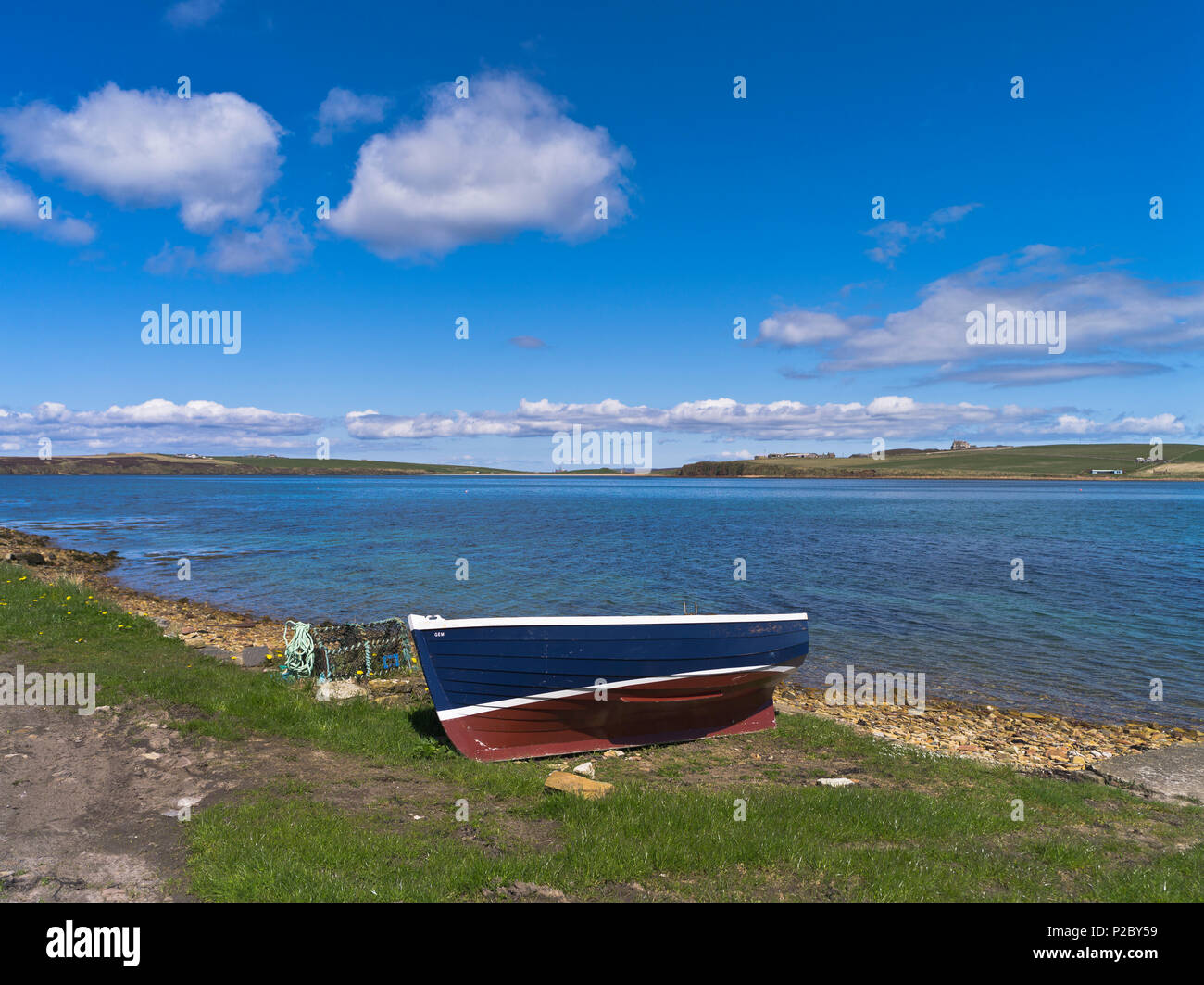 dh Widewall bay HERSTON ORKNEY Boat beached along shore line coast south ronaldsay scotland isles Stock Photo
