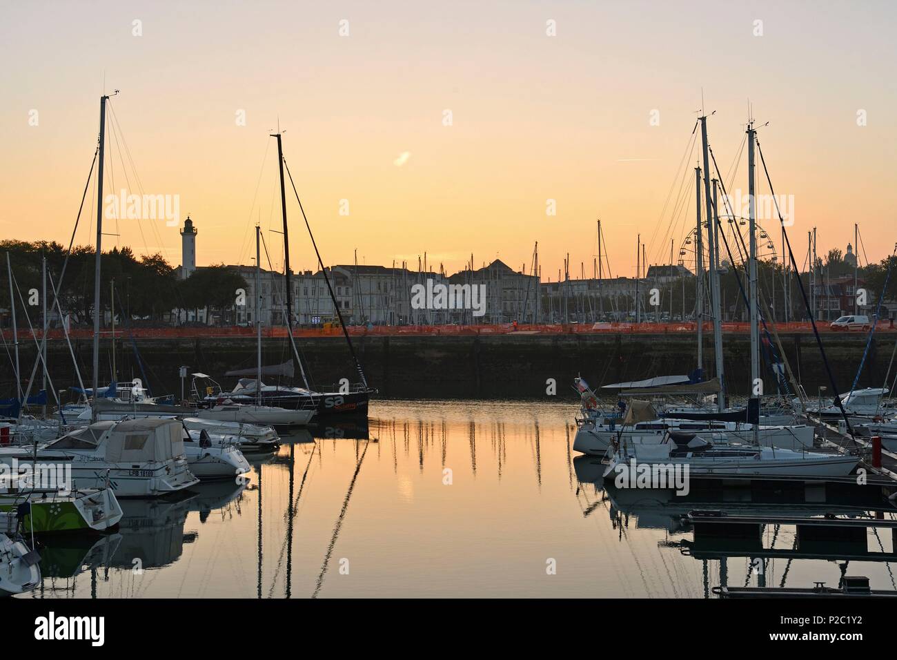 France, Charente-Maritime, La Rochelle, the wet dock of the Old Port and its lighthouse Stock Photo