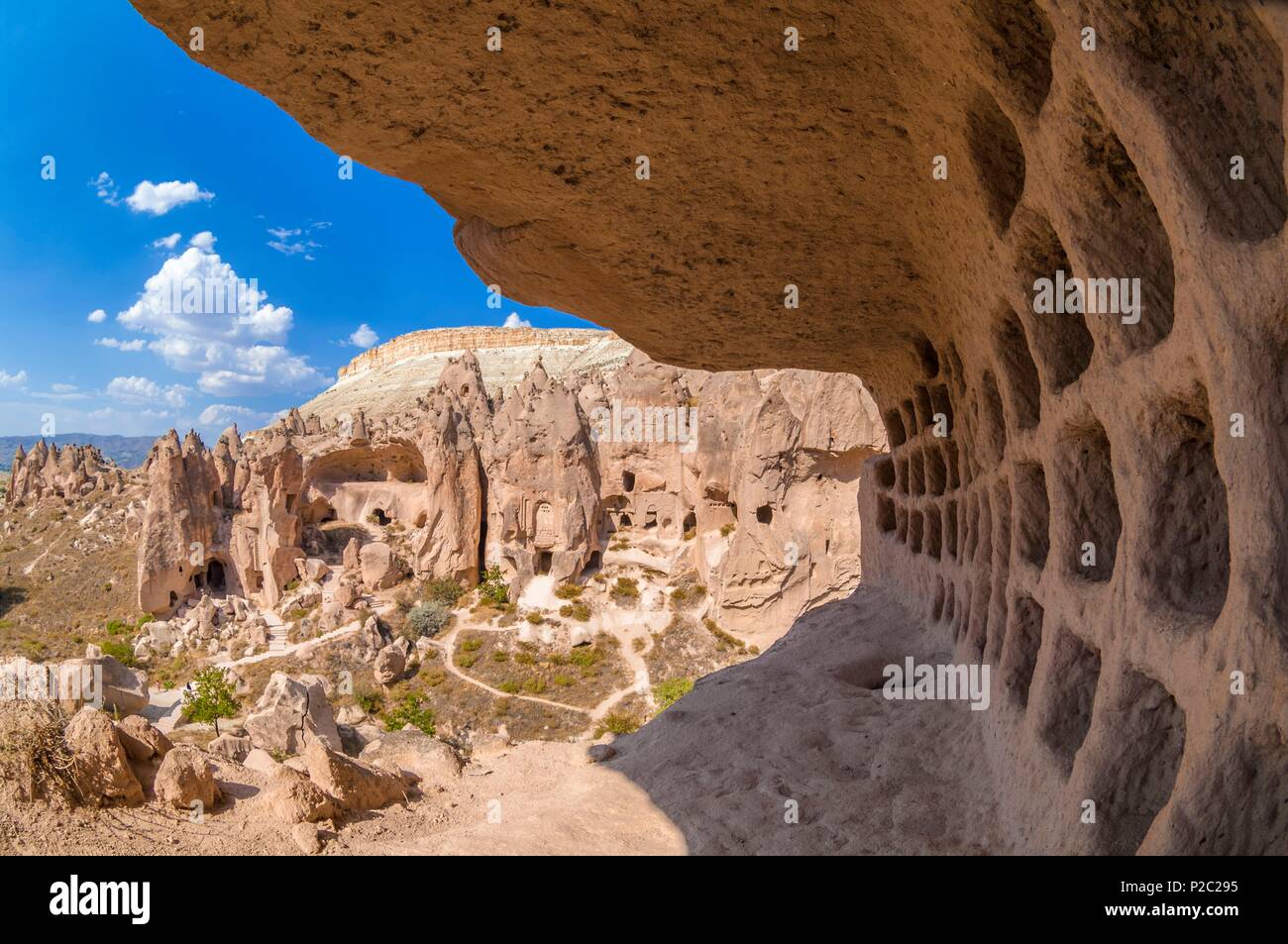 Turkey, Central Anatolia, Nevşehir province, Cappadocia UNESCO World Heritage Site, Avanos, open-air museum of Zelve, troglodyte city which was the main religious center of the 9th-13th century in Cappadocia, Göreme National Park, here the cellar, the upper section of the cellar was formed of two sections where the grapes were crushed with the feet, the grape juice that flowed through a small hole was collected and poured inside pots for fermentation, the fermentation process completed, the grape juice was stored in jars for daily use no additive material was included in the ceremonial Stock Photo