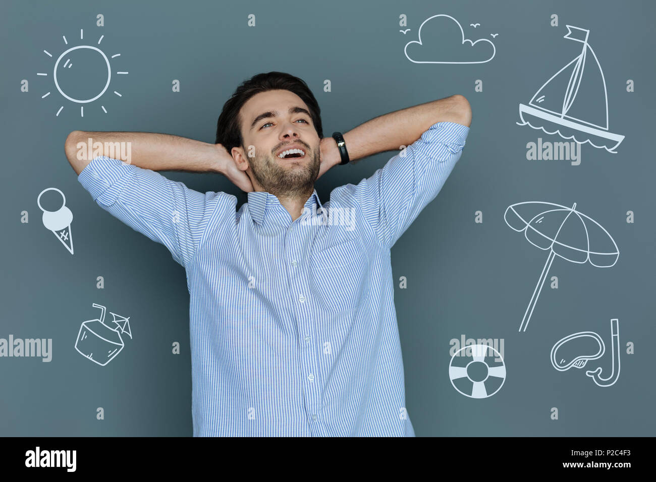 Happy manager relaxing while being at the seaside Stock Photo