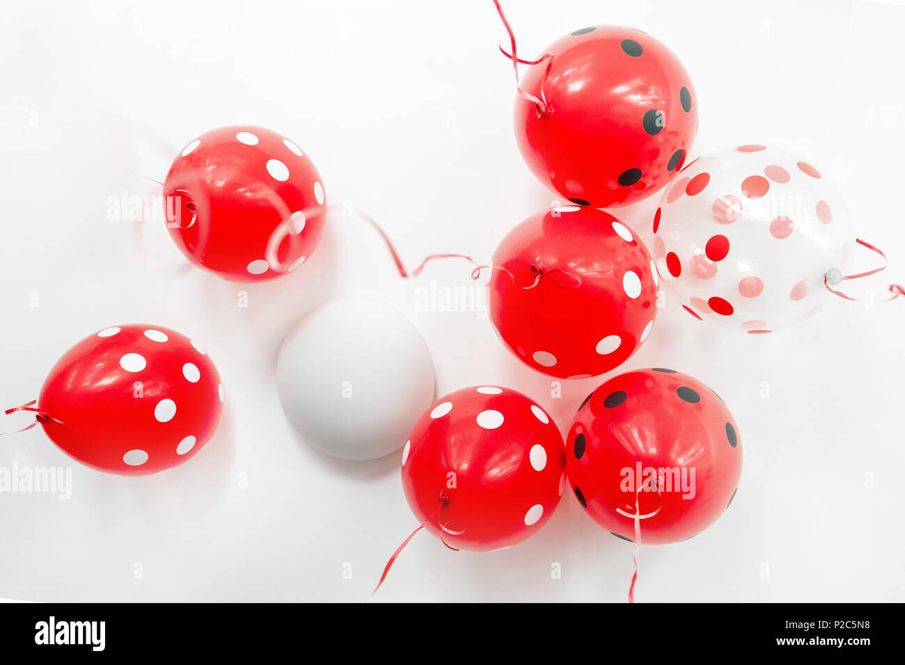 Beautiful Red Dotted Balloons Floating At White Ceiling