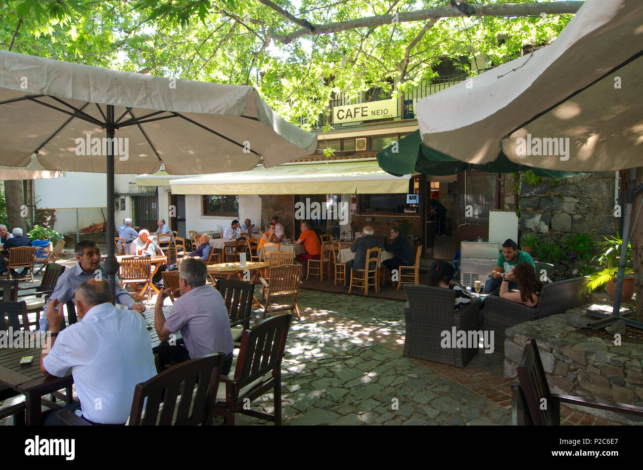 Shady square with Cafe in Palaichora, Troodos mountains, Cyprus Stock Photo