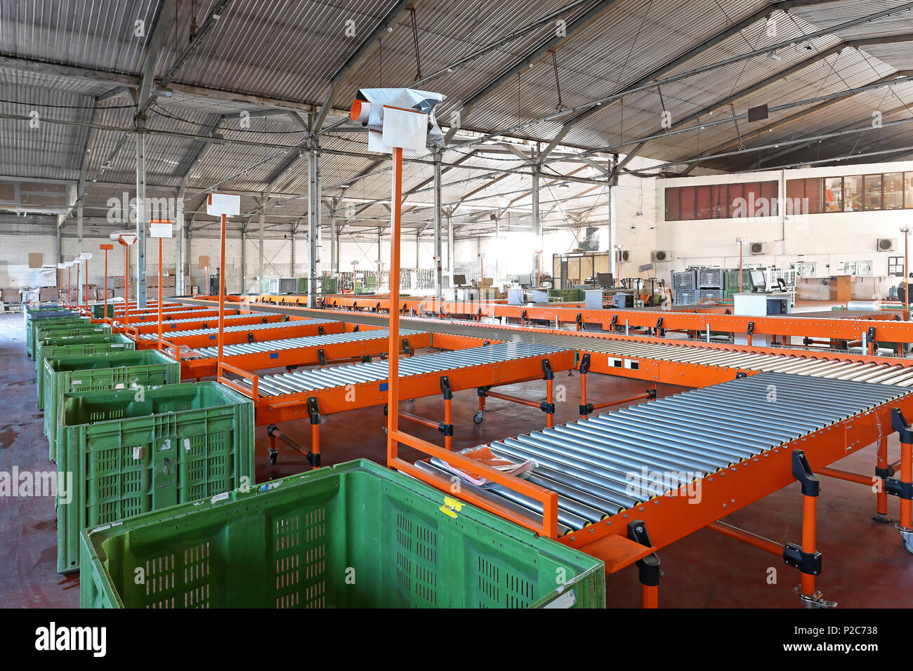 Conveyor Belt System For Sorting in Warehouse Stock Photo - Alamy