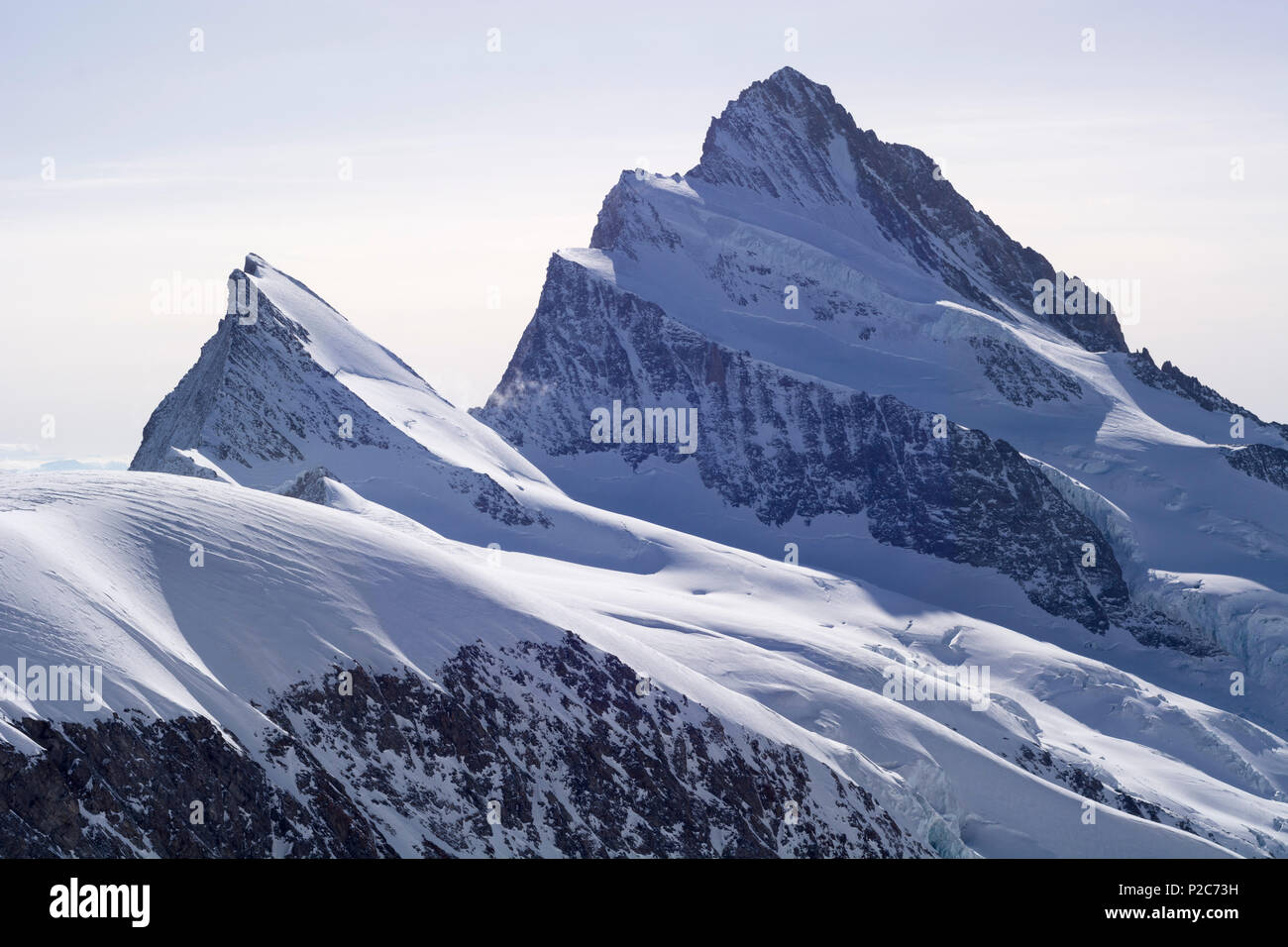 The Finsteraarhorn with its smaller neighbour Agassizhorn, Bernese Alps, cantons of Valais and Bern, Switzerland Stock Photo