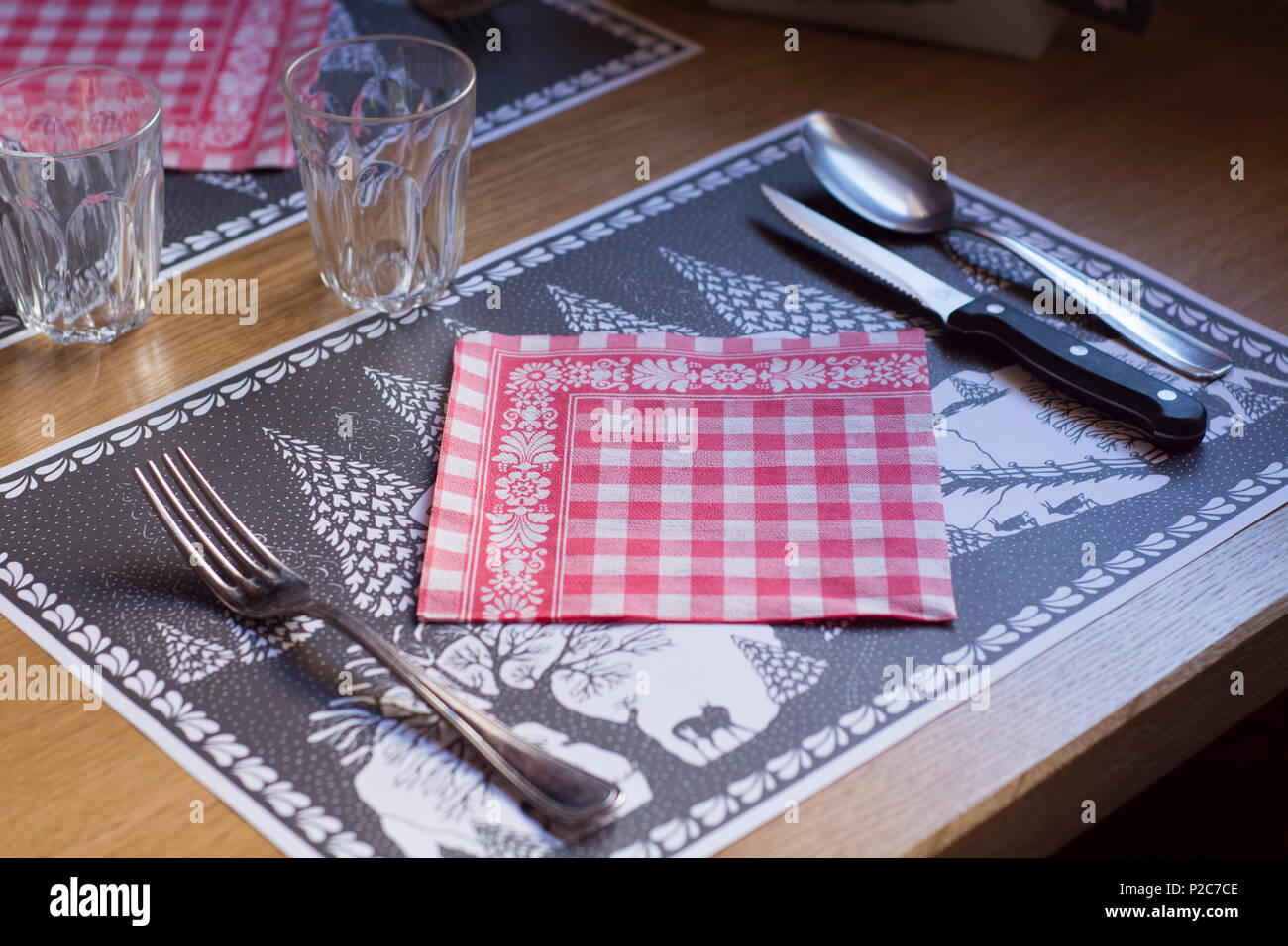 A typically Swiss place setting, Diablerets Hut, Vaud Alps, canton of Vaud, Switzerland Stock Photo