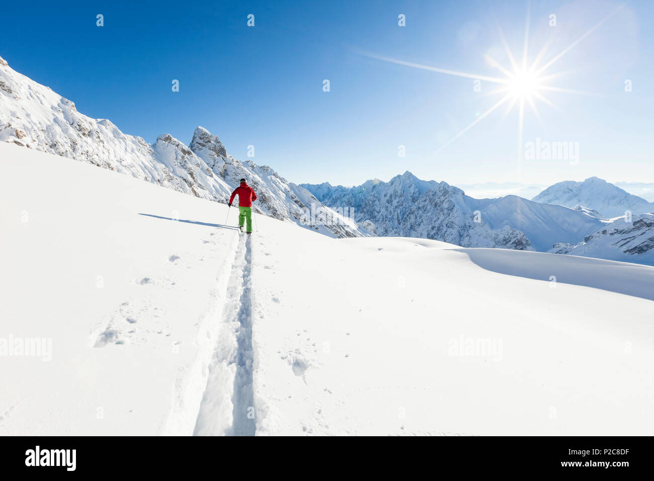 skier in deep powder snow, Zugspitze, Upper Bavaria, Germany Stock Photo