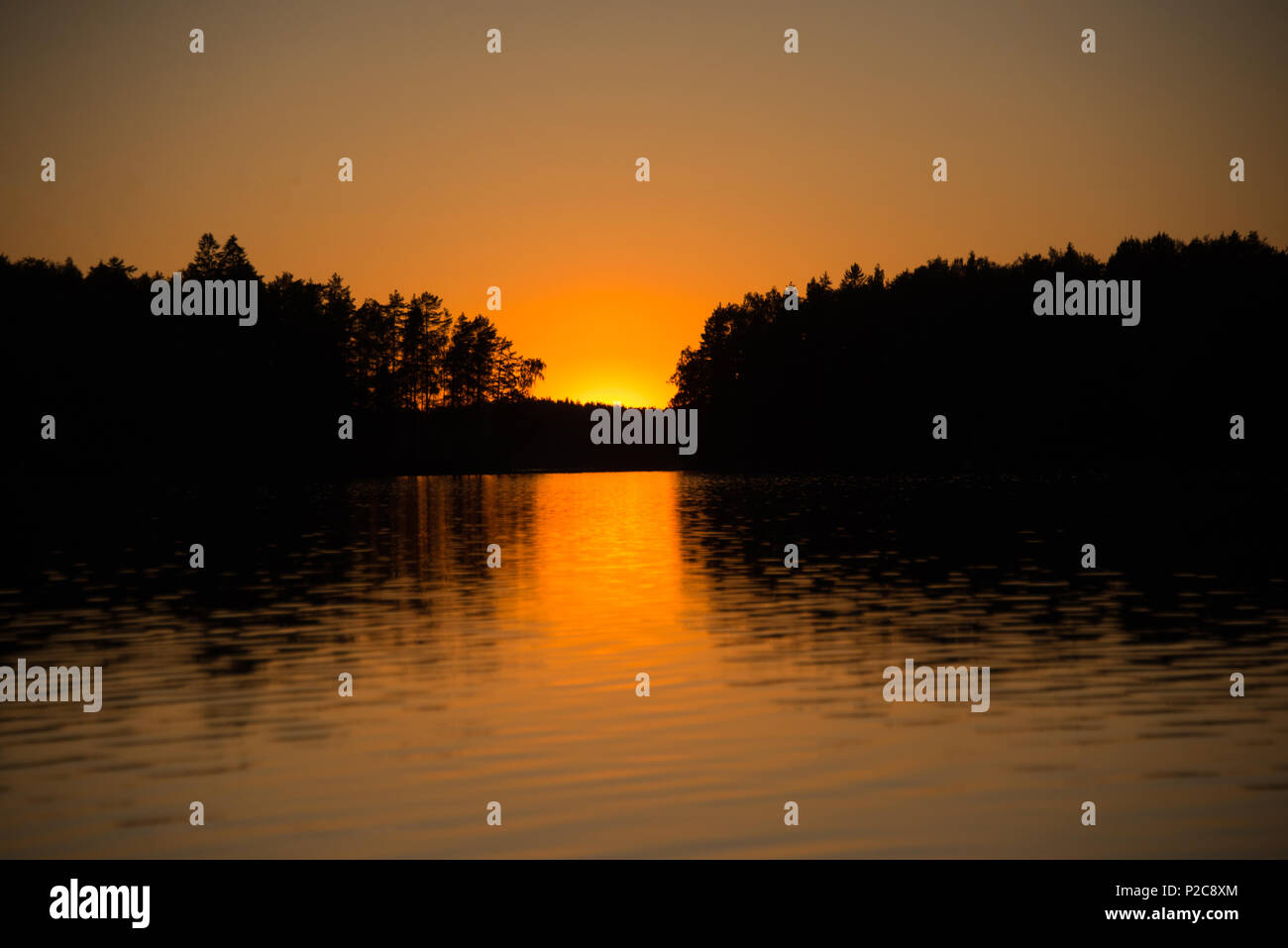 The moment after the sunset. Lake Kukkia, Luopioinen, Finland. Stock Photo