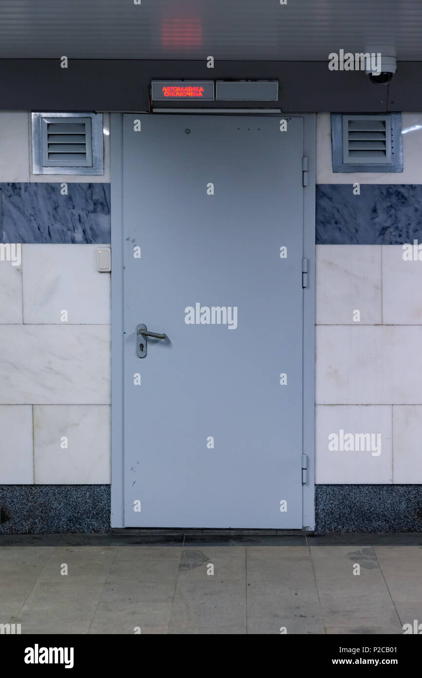 The Steel Gray Door In The Subway Is Equipped With Access Control