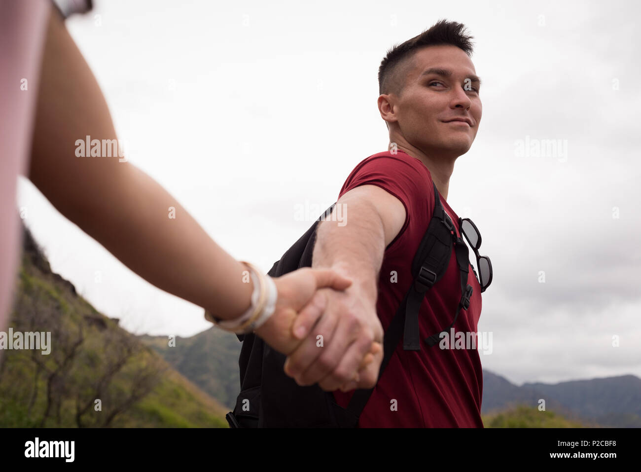 Smart couple holding hands hi-res stock photography and images - Alamy