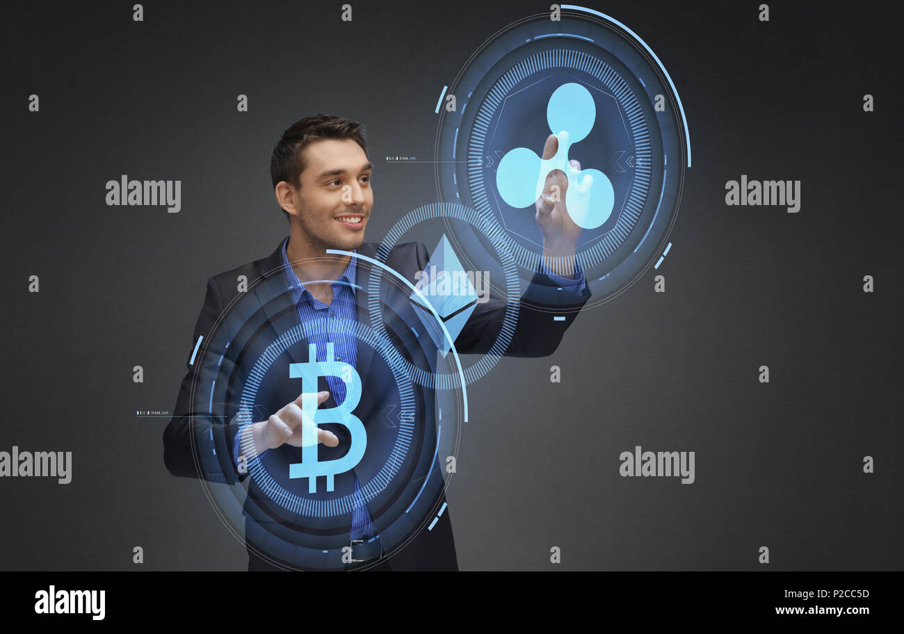 businessman with cryptocurrency holograms Stock Photo